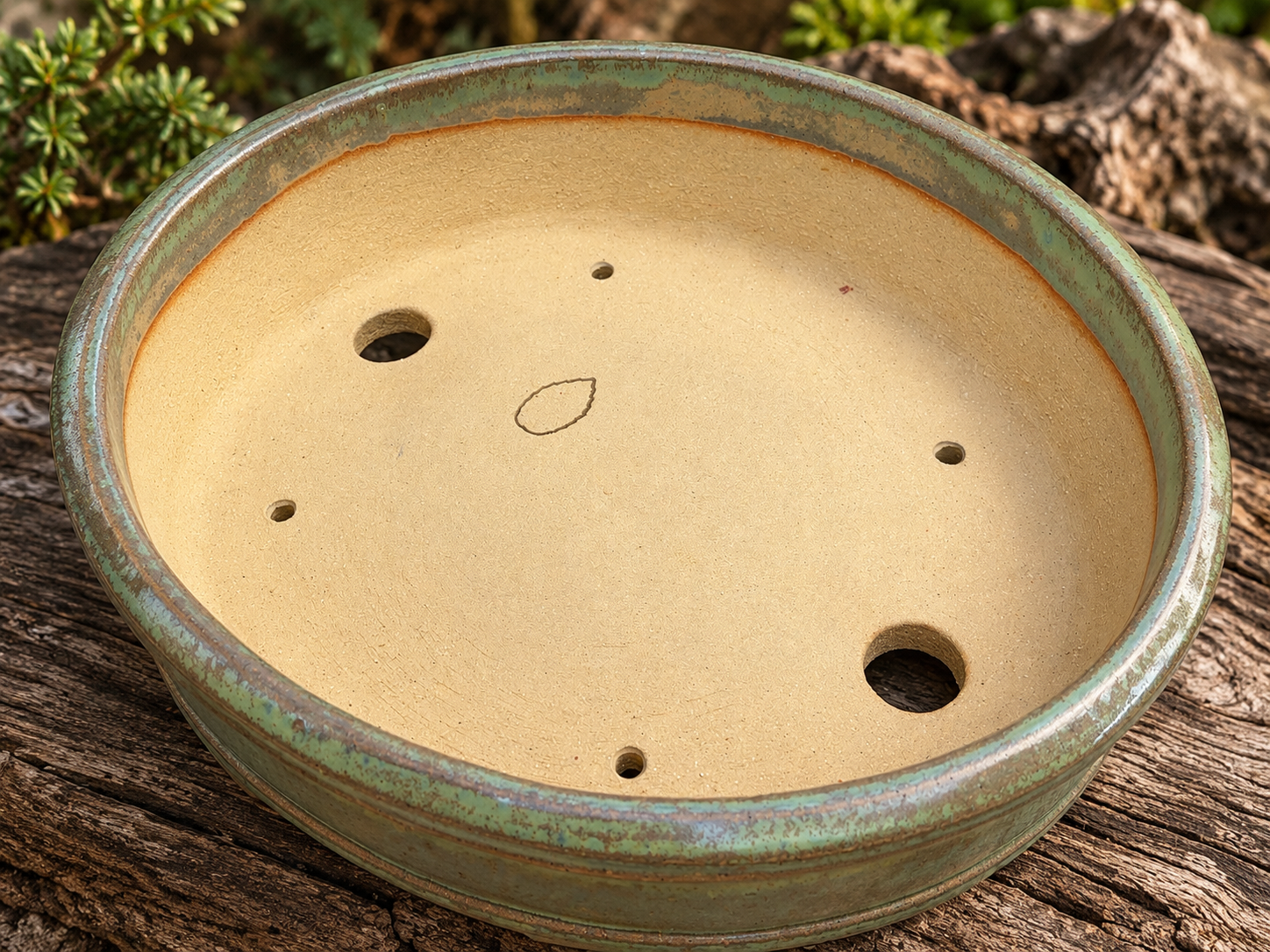 Drainage and fixing hole layout from the Seasons Restrained collection, by Ian Jobling Ceramics, The Pot Maker's Place.