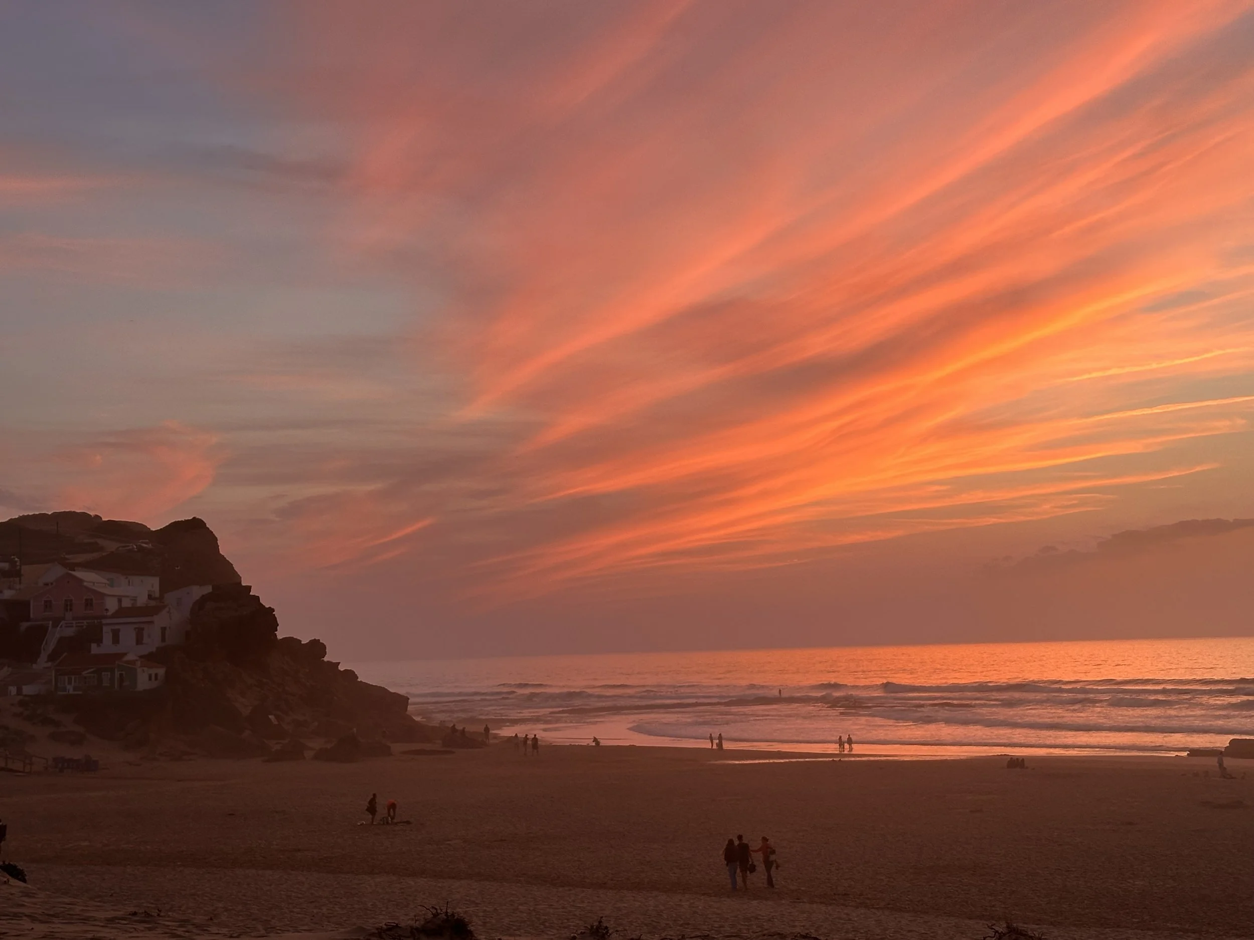 Sunset over the beach on the western Algarve coast