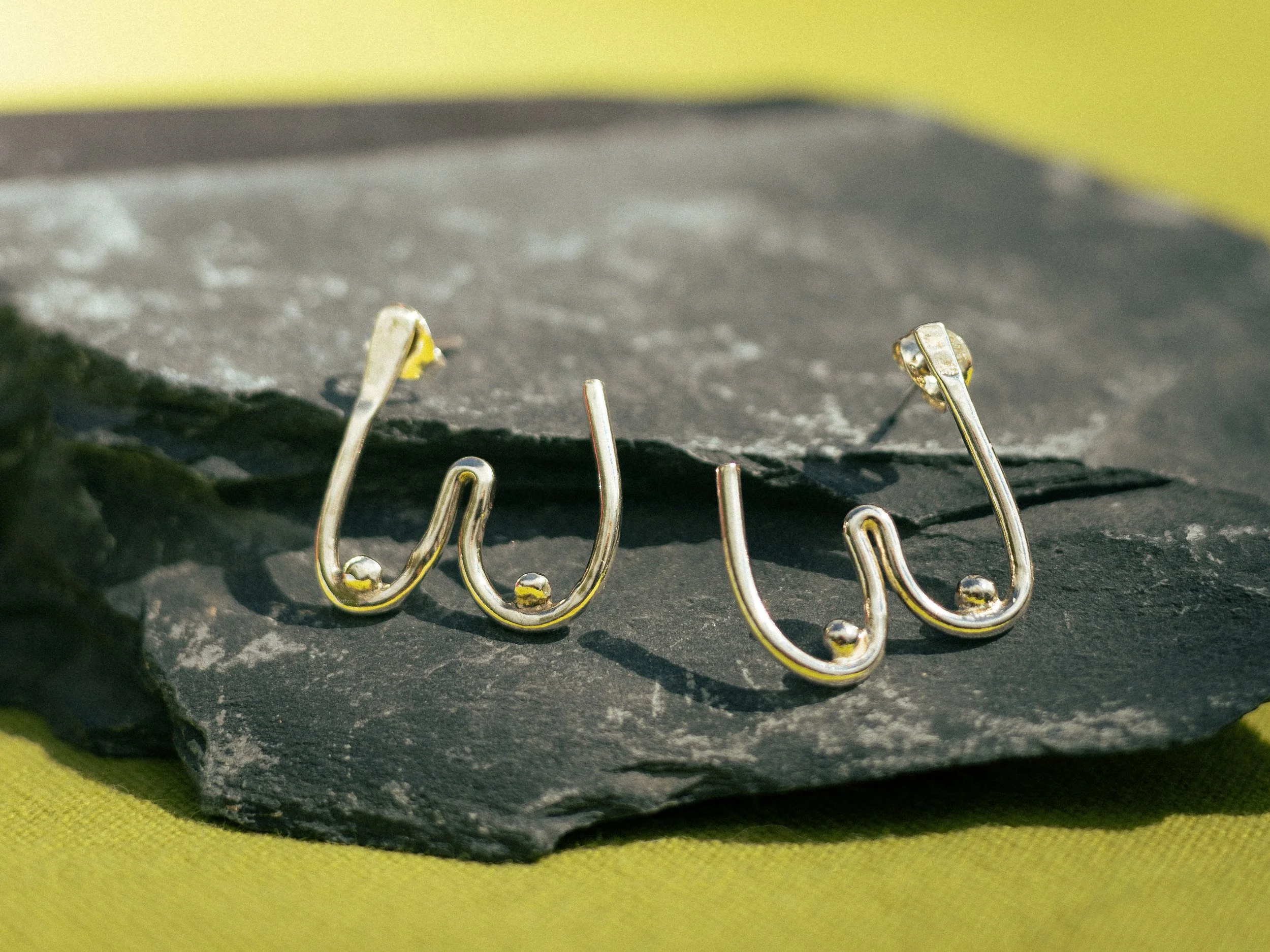 silver-breasts-earrings.jpg