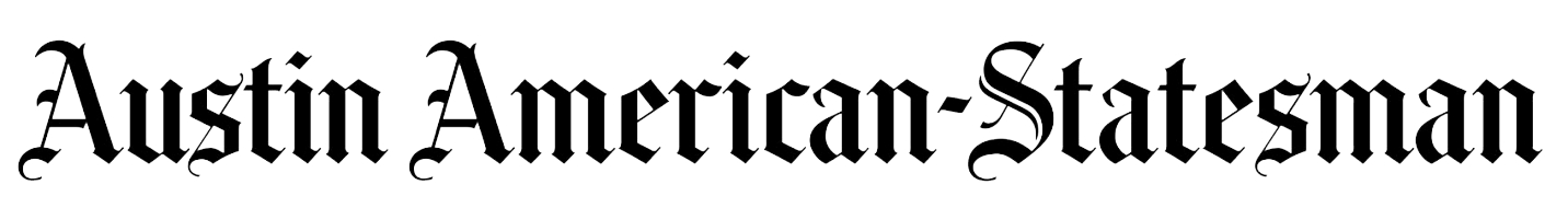 Text reading 'Austin American-Statesman' in black gothic font on a white background.