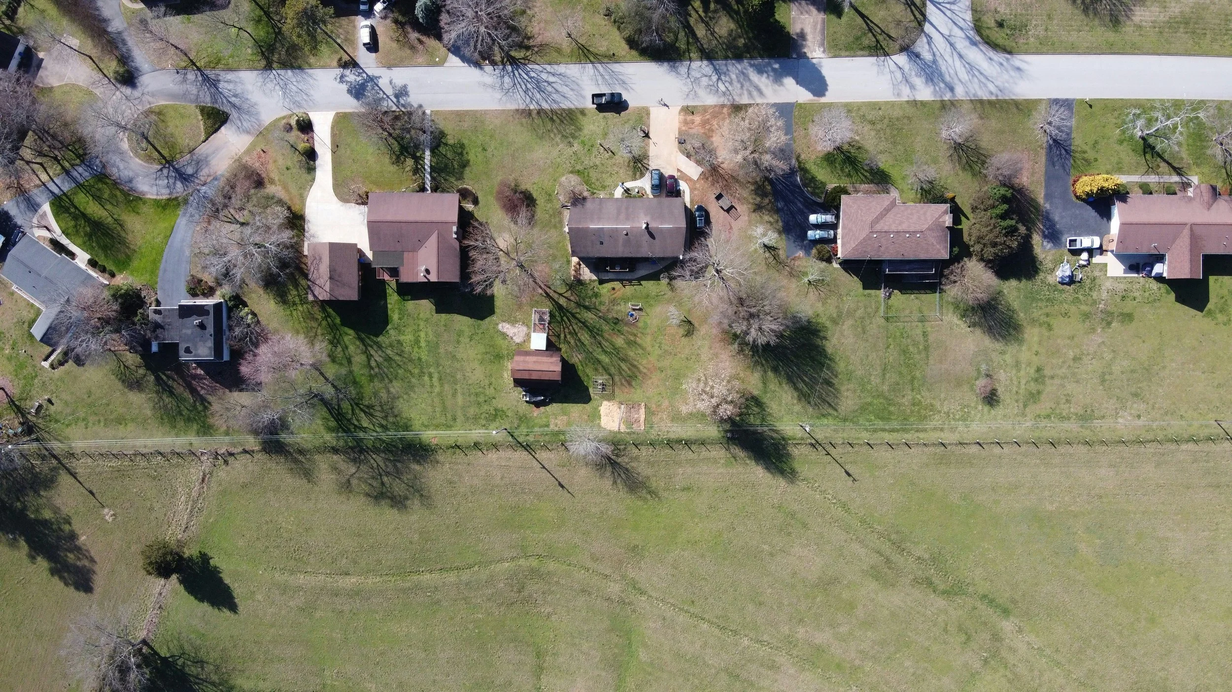 Aerial view of homes. Land use. Lot lines. Boundaries.