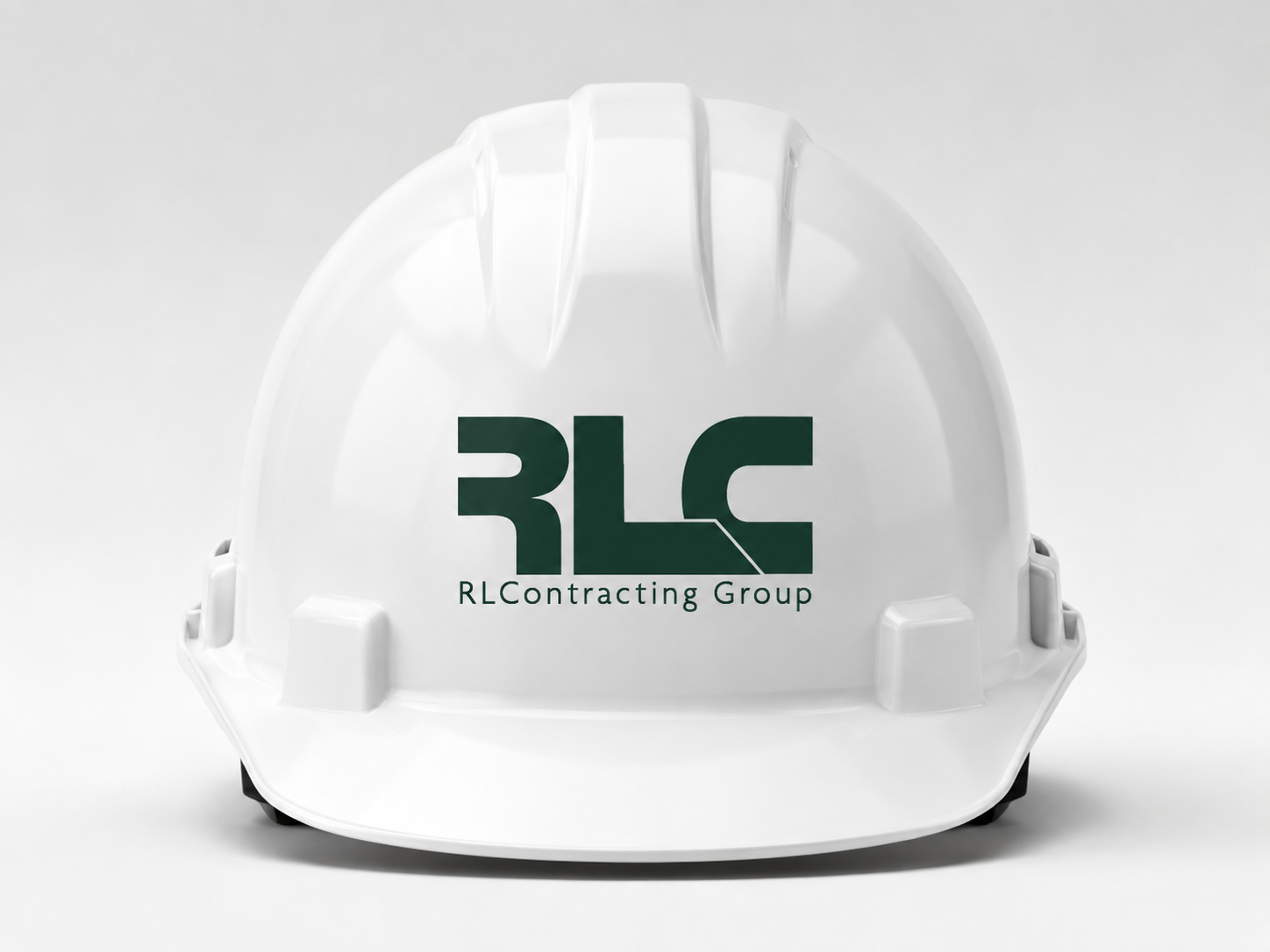 White construction helmet with the RLContracting Group logo and text printed in dark green on the front, set against a plain white background.