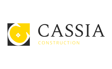 Logo de Cassia Construction avec un symbole circulaire jaune et noir.