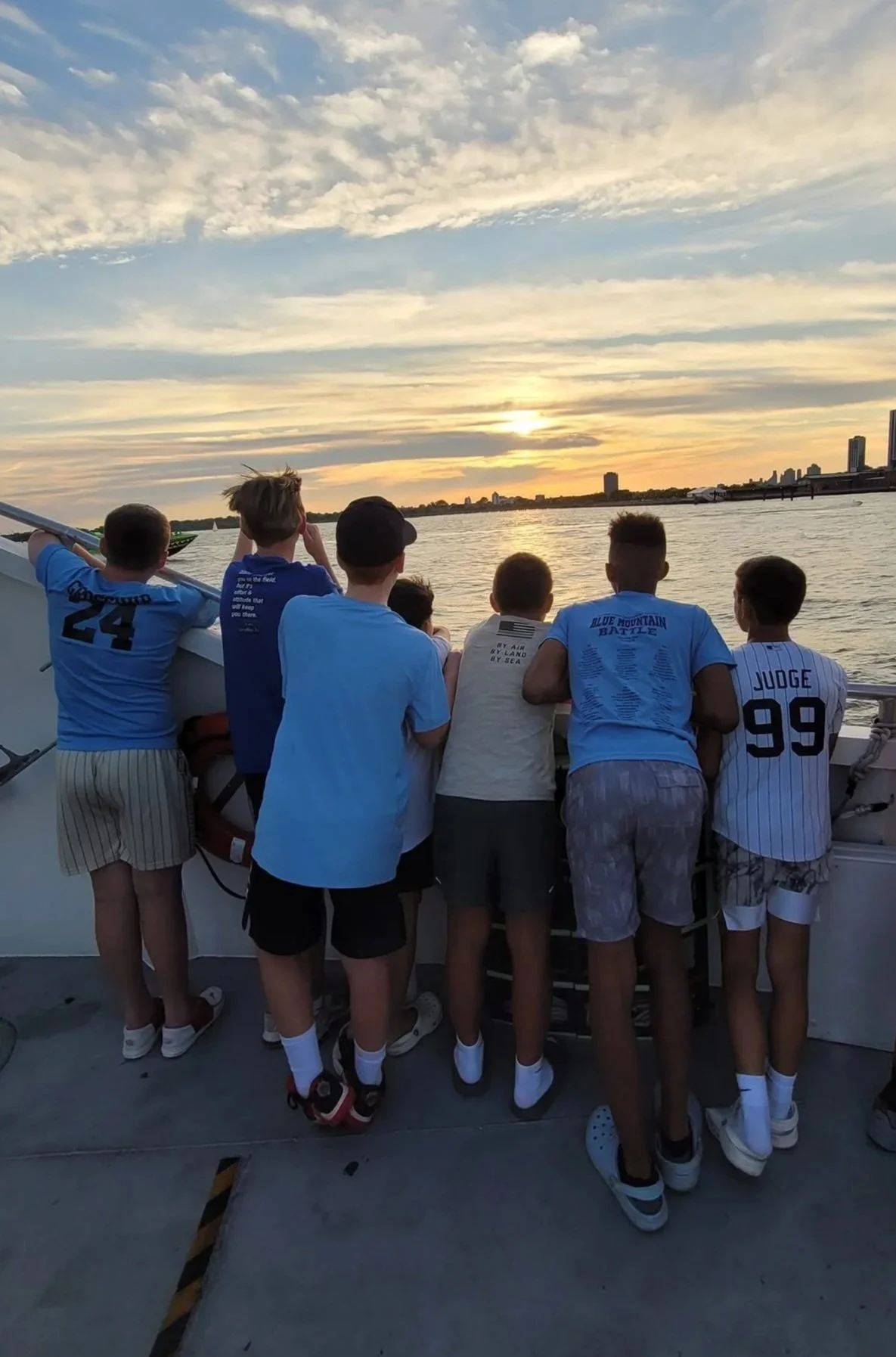 12u travel team enjoying a river cruise tour around New York before heading to their tournament.