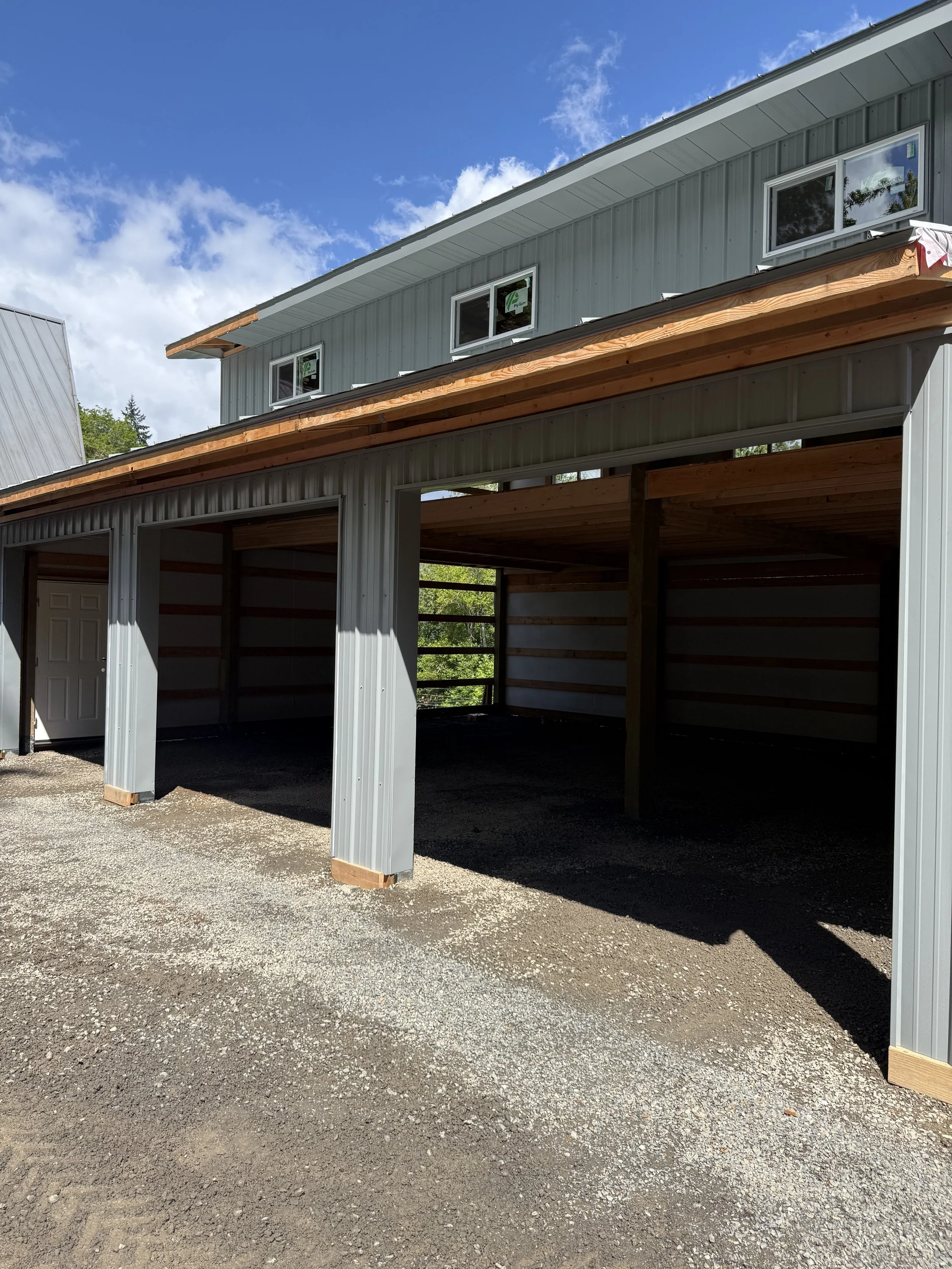 Newly constrcutred three car garage built by TJ Parkis Structures in Kitsap County, WA
