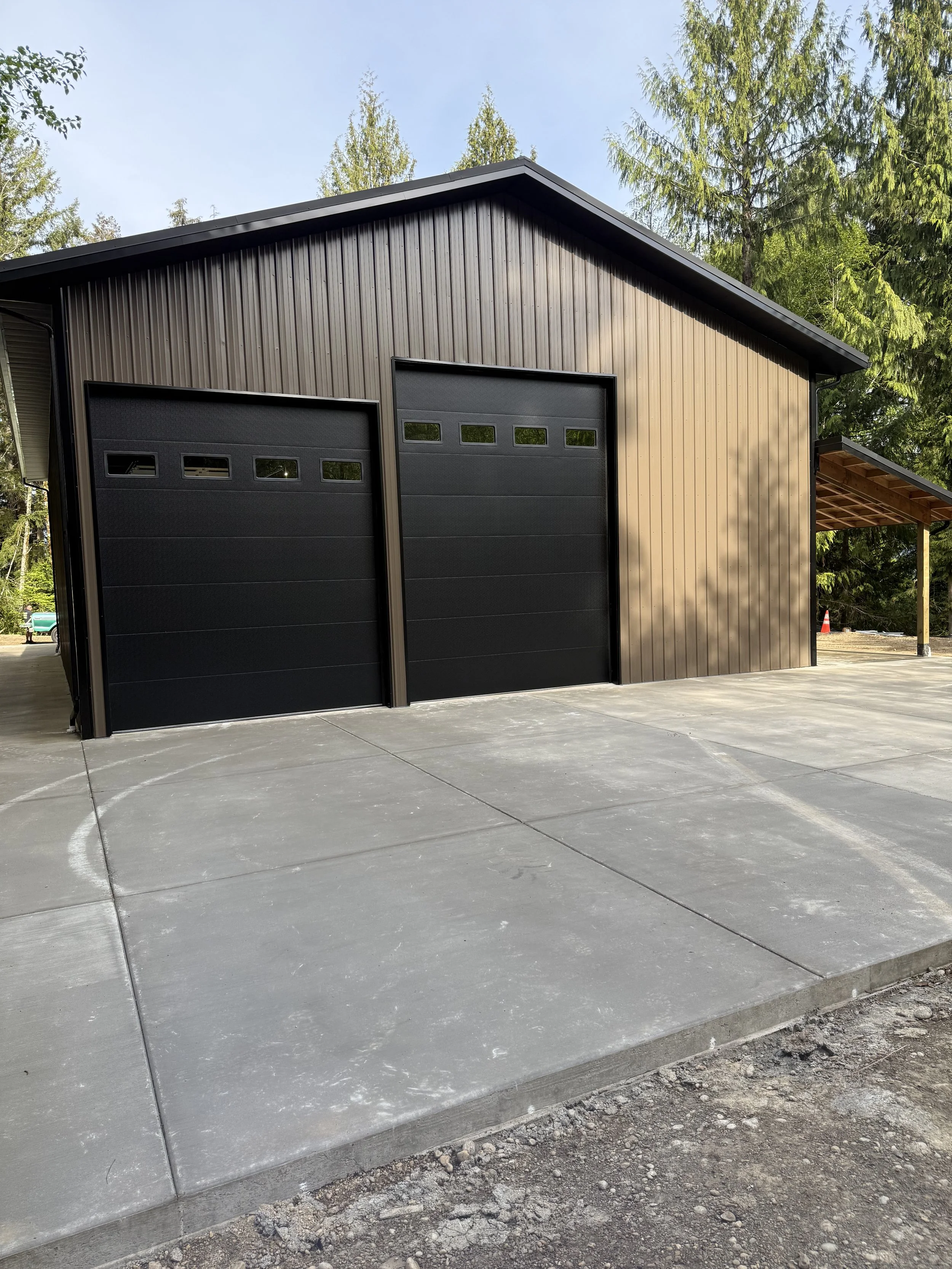 Brand new garage shop building with driveway in Shelton, WA