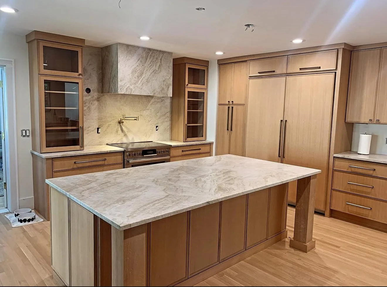 Custom kitchen with integrated white oak cabinetry in Washington Township, Michigan