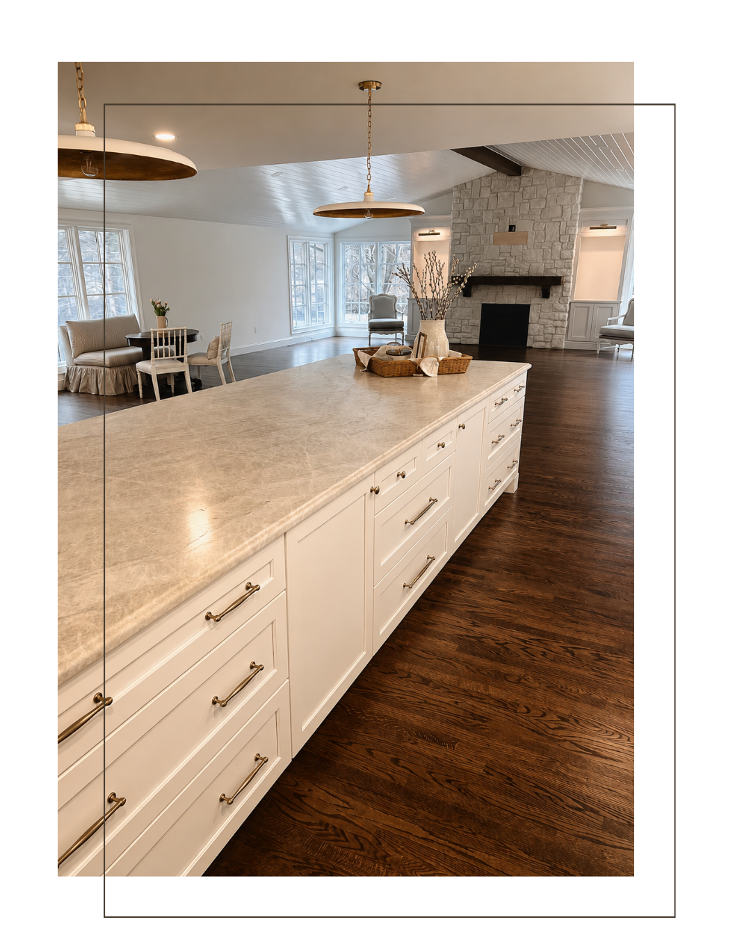Luxury custom kitchen with white cabinetry and oversized island by Metro Detroit custom cabinet maker EK Custom Cabinetry