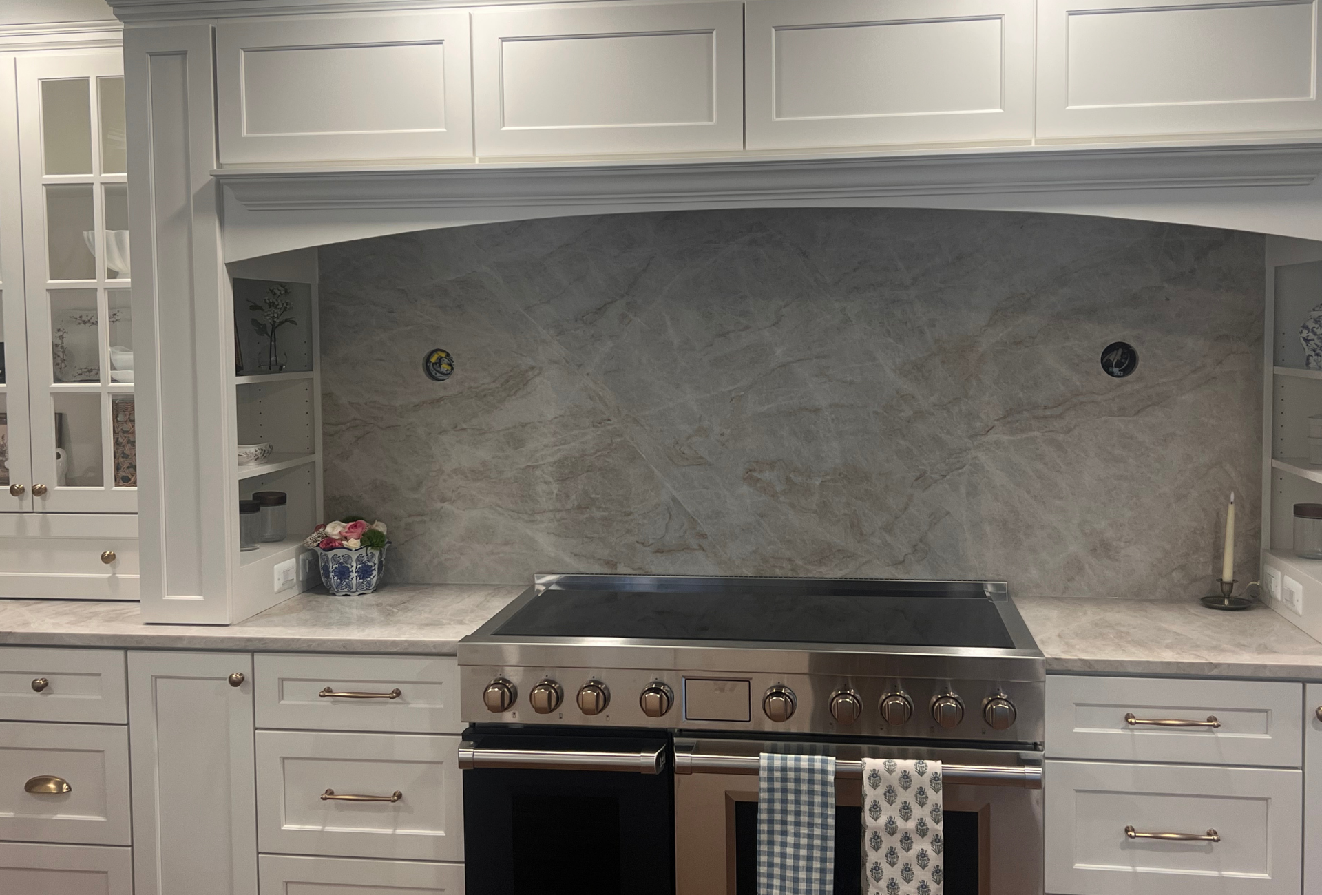 Luxury kitchen remodel featuring custom white cabinetry in Metamora, Michigan