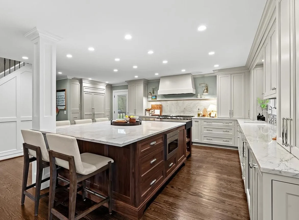 Custom kitchen cabinetry with white shaker cabinets and quartz island by EK Custom Cabinetry serving Metro Detroit, Michigan