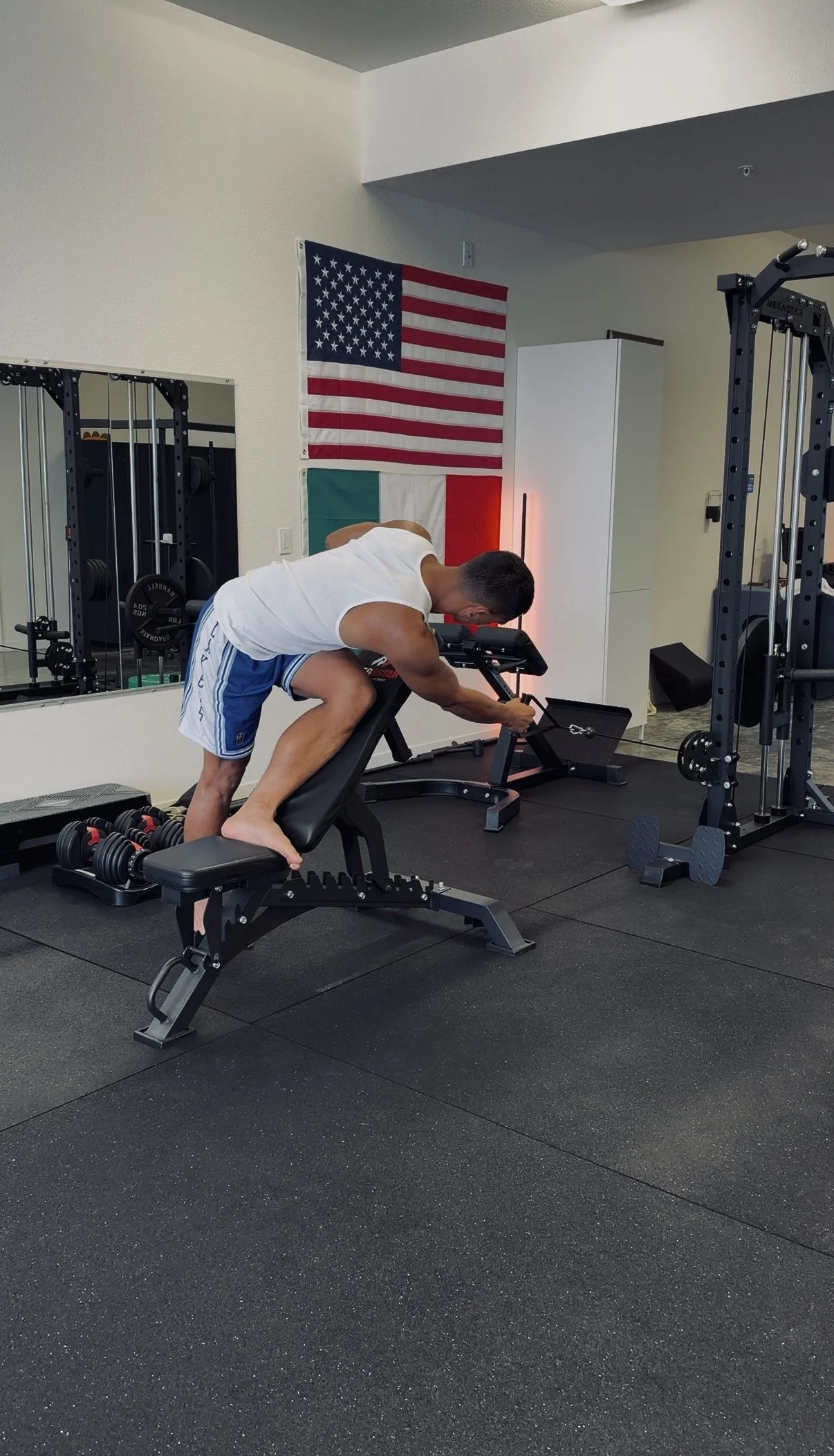 Patient performing a cable pigeon row as part of a rehab exercise program at Ninety Four Performance & Rehab in Richmond, CA
