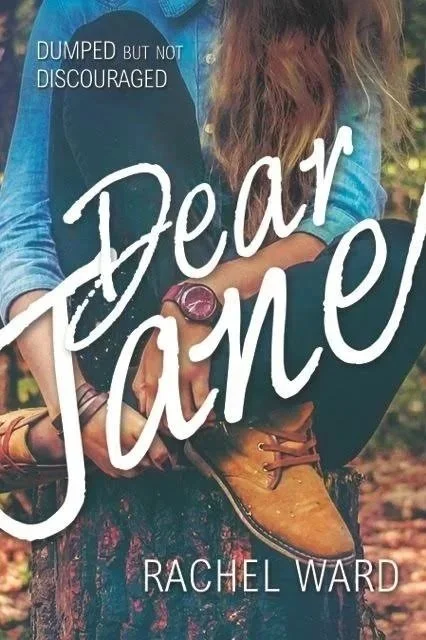 Book cover titled 'Dear Jane' by Rachel Ward, with the subtitle 'Dumped but not discouraged'. A person wearing a blue jacket, jeans, and brown shoes is holding a brown coffee cup with a pink wristwatch.