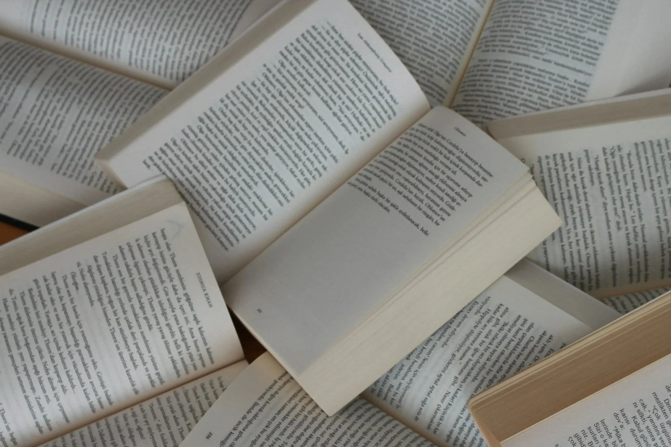 open books in a pile
