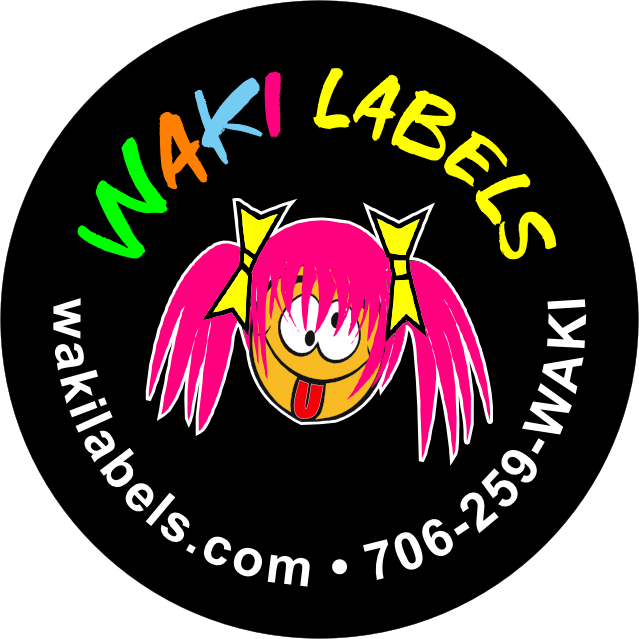 Logo for WAKI LABELS featuring a cartoon face with pink hair, a yellow face, and a tongue sticking out, surrounded by colorful text that reads "WAKI LABELS" and "wakitabels.com 706-259-WAKI".
