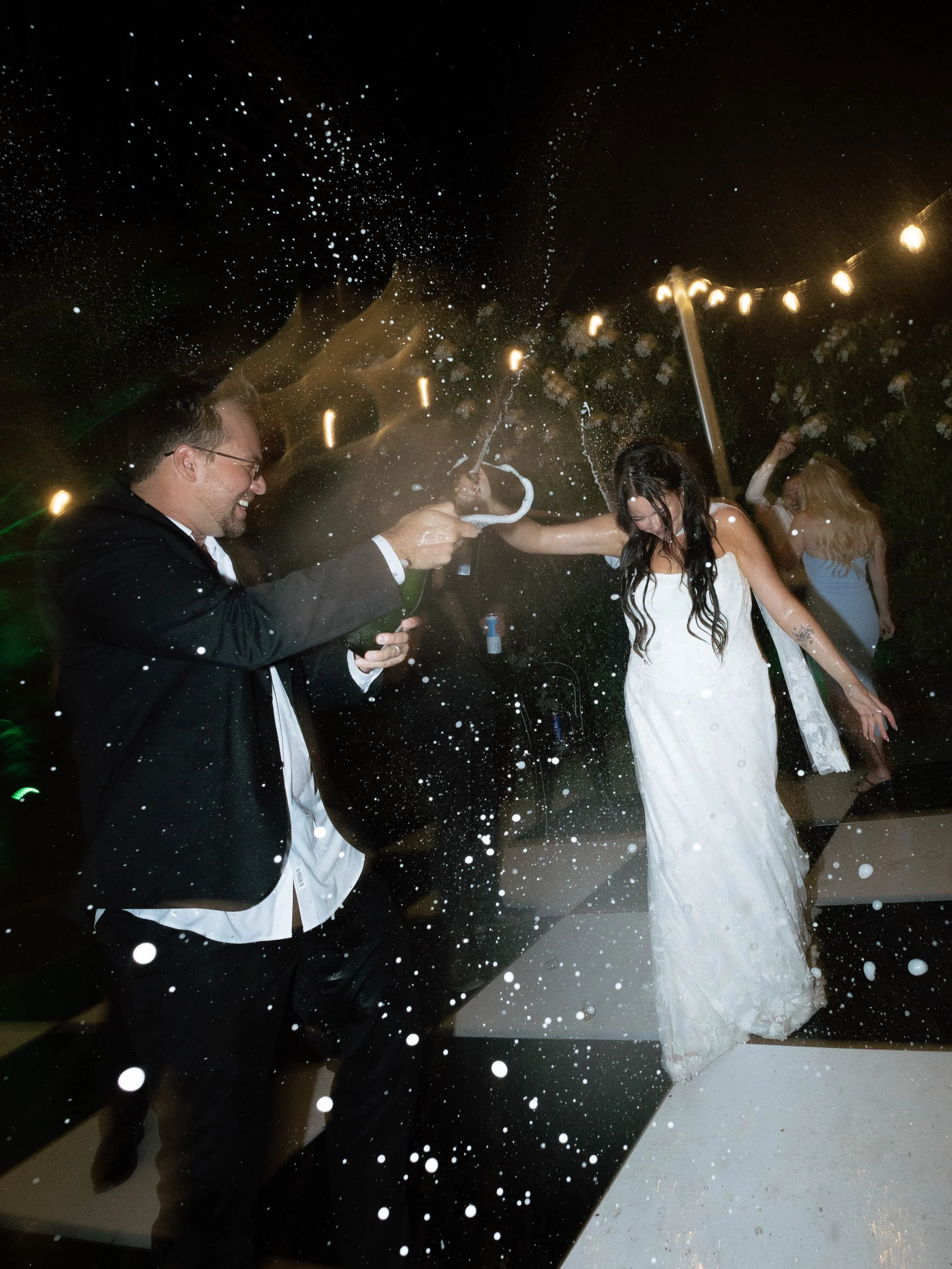 Reception of a lifetimeeee!🍾If your party isn&rsquo;t ending with you jumping into a pool and spraying champagne all over the dance floor, are you even having a good time!?🤪

#phoenixweddingphotographer #phoenixphotographer #arizonaphotographer #sc