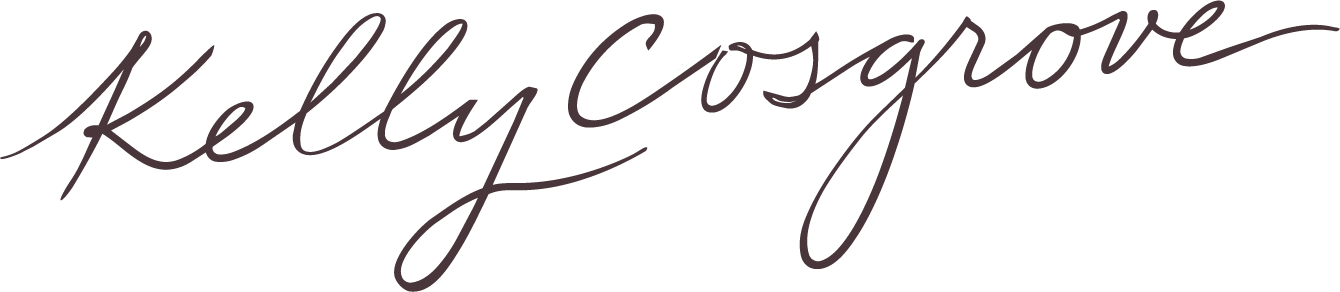 Text that reads "Kelly Cosgrove" in a handwritten script style.