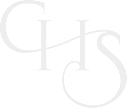 Stylized white logo with large letters C, H, S on a black background.