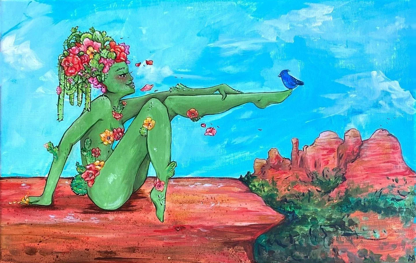 A vibrant painting of a green-skinned woman with flowers in her hair, sitting on a reddish-brown rock formation. She has flowers and leaves covering her body and is reaching out with her left arm toward a small blue bird. The background features a blue sky with a few clouds and a rugged landscape of red rock formations.