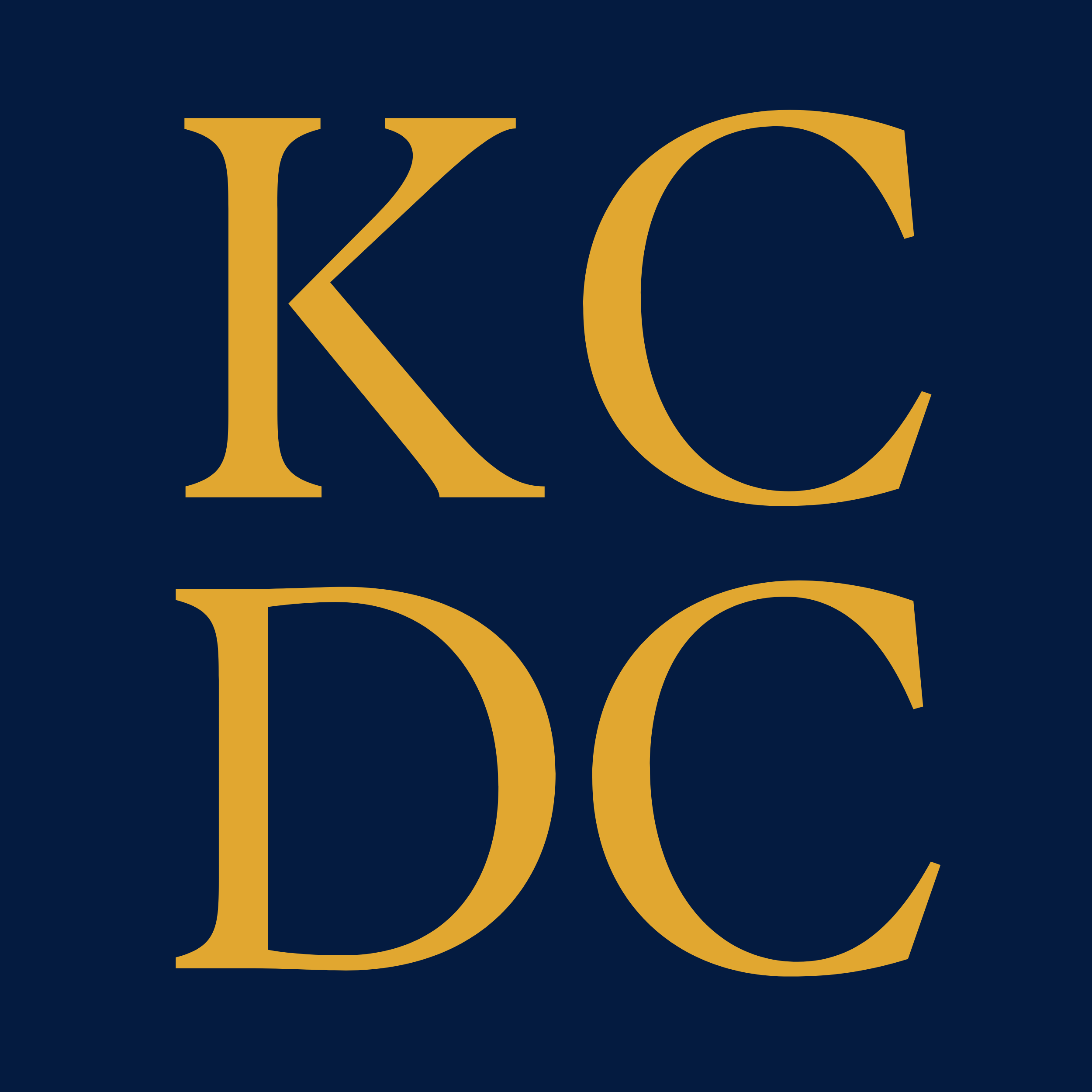 Close-up of two overlapping gold-colored Greek letters Kappa (Κ) and Delta (Δ) on a dark blue background which is the logo KCDC acronym for the Kane County Diagnostic Center. It is a stand in for a clinician's photo.