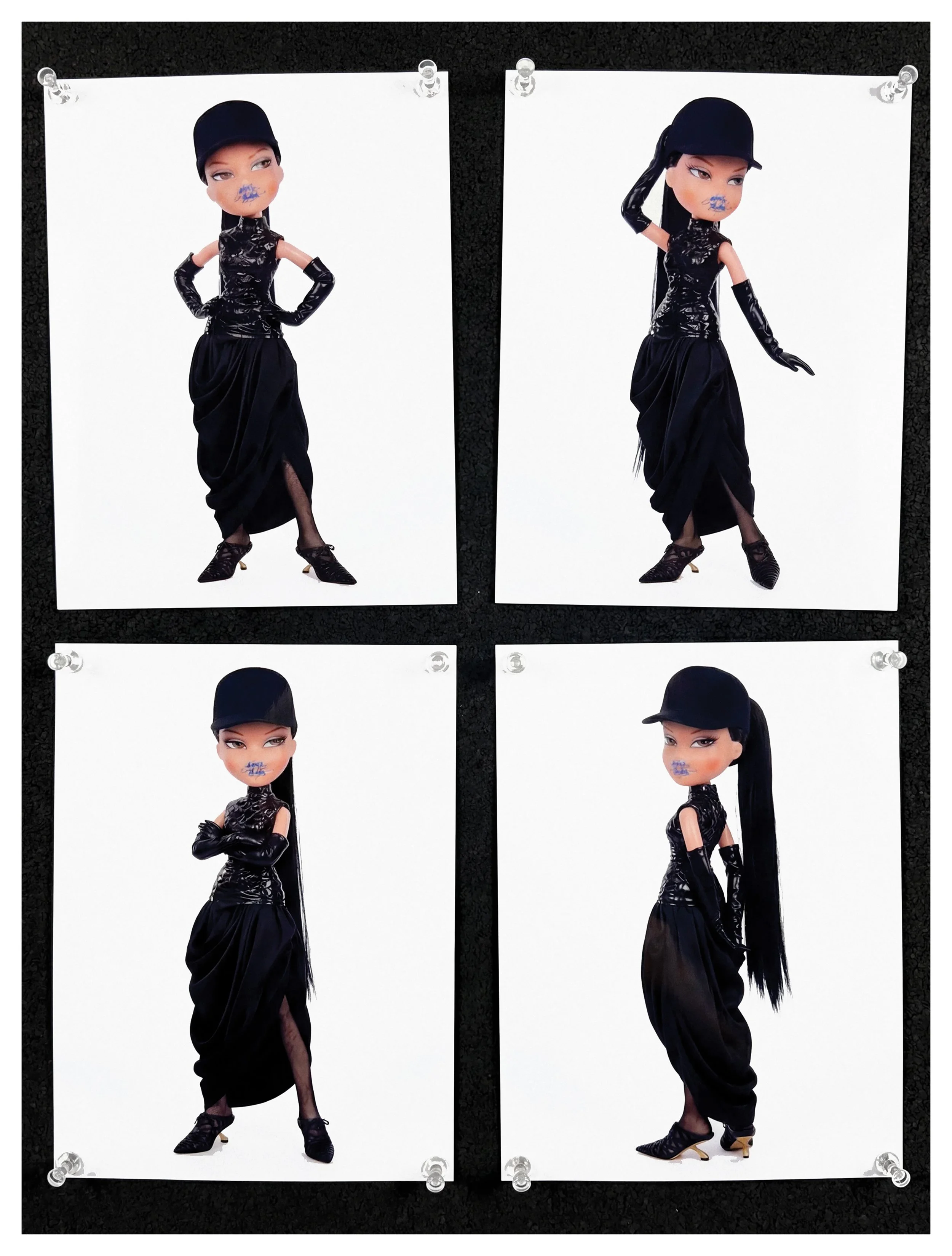 Four photographs of a fashion doll dressed in black with a black hat, gloves, and high heels, posed against a white background and pinned to a black surface.
