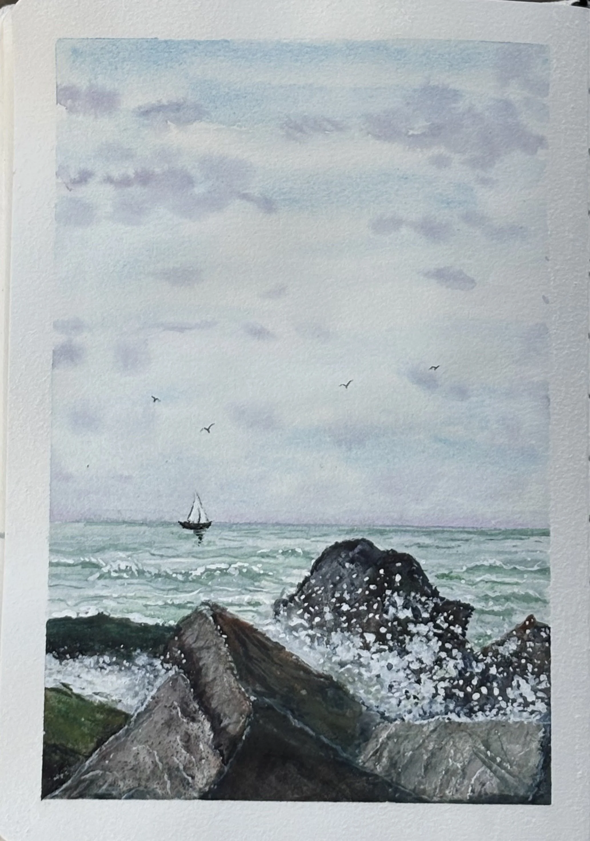 A watercolor painting of a seascape with rocky shoreline in the foreground, waves crashing against the rocks, a boat in the distance on the water, and a cloudy sky with birds flying overhead. Alexander Avenue in Cape May Point, New Jersey.