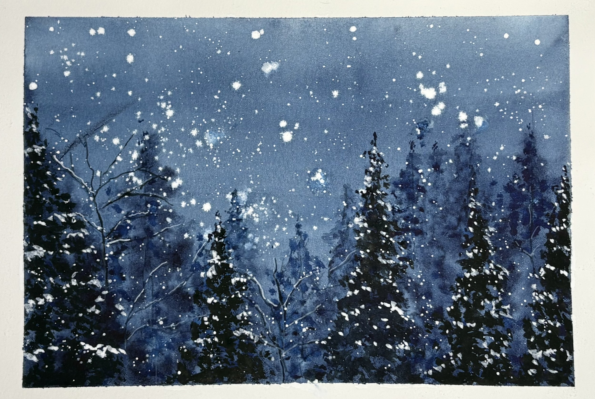 A watercolor painting of falling snow at night with the silhouette of snow-covered trees in the foreground. This is a water color journal entry in an Etchr journal.