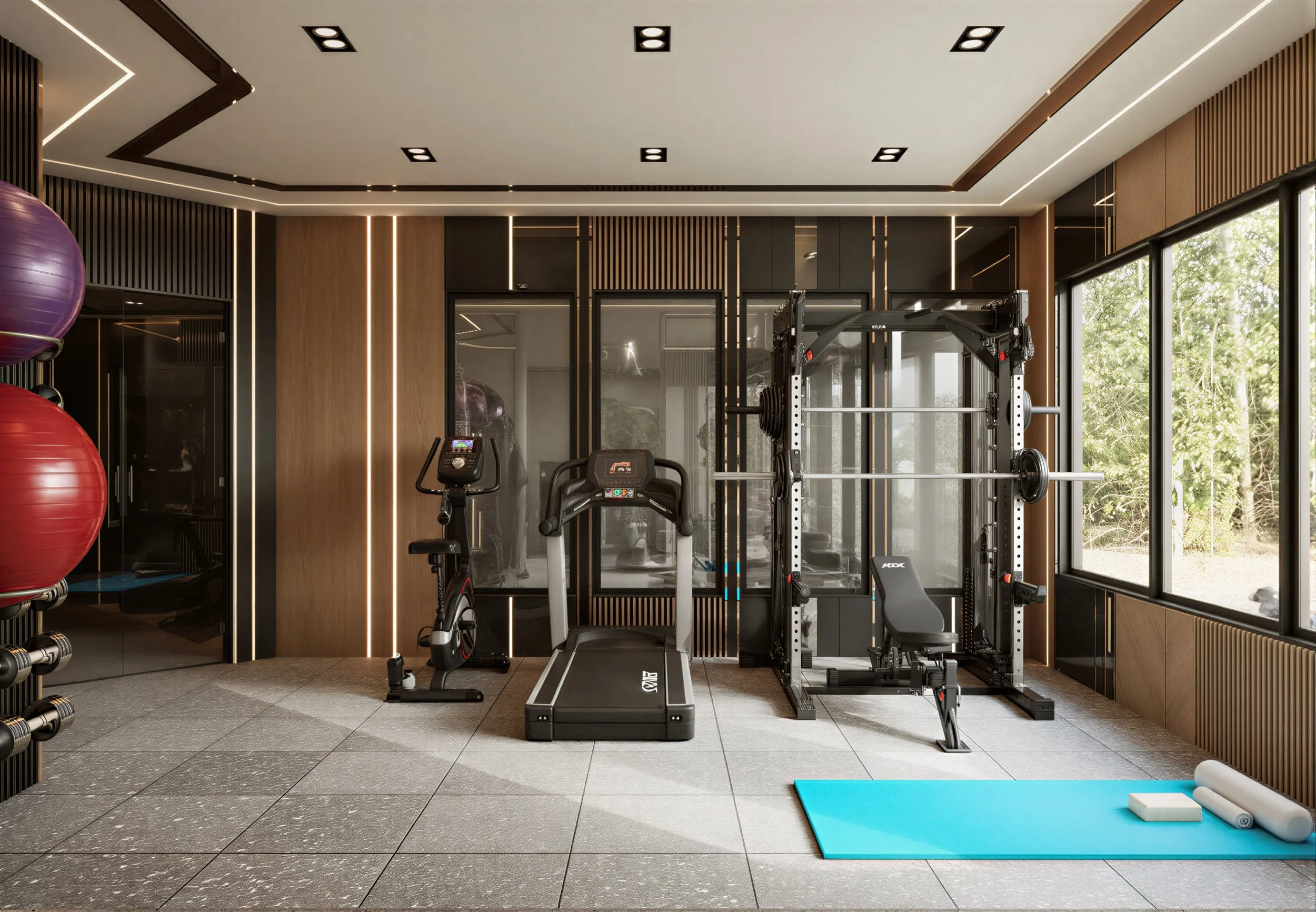 A modern fitness room with exercise equipment, including a treadmill, stationary bike, and weightlifting machine, with a blue yoga mat and foam rollers on the floor, and large windows letting in natural light.