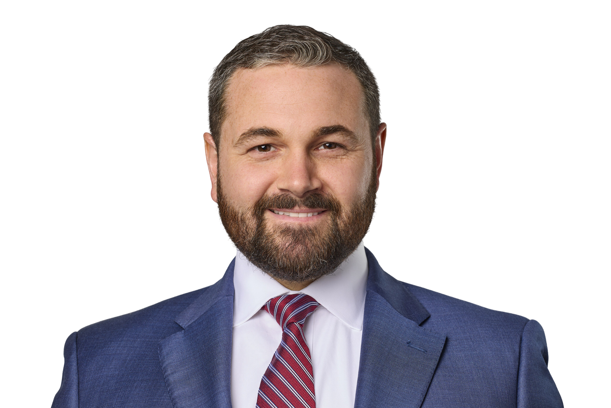 Portrait of a happy man in a business suit with a striped tie.