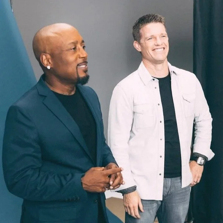 Daymond John and Russell Brunson during a brand partnership photoshoot