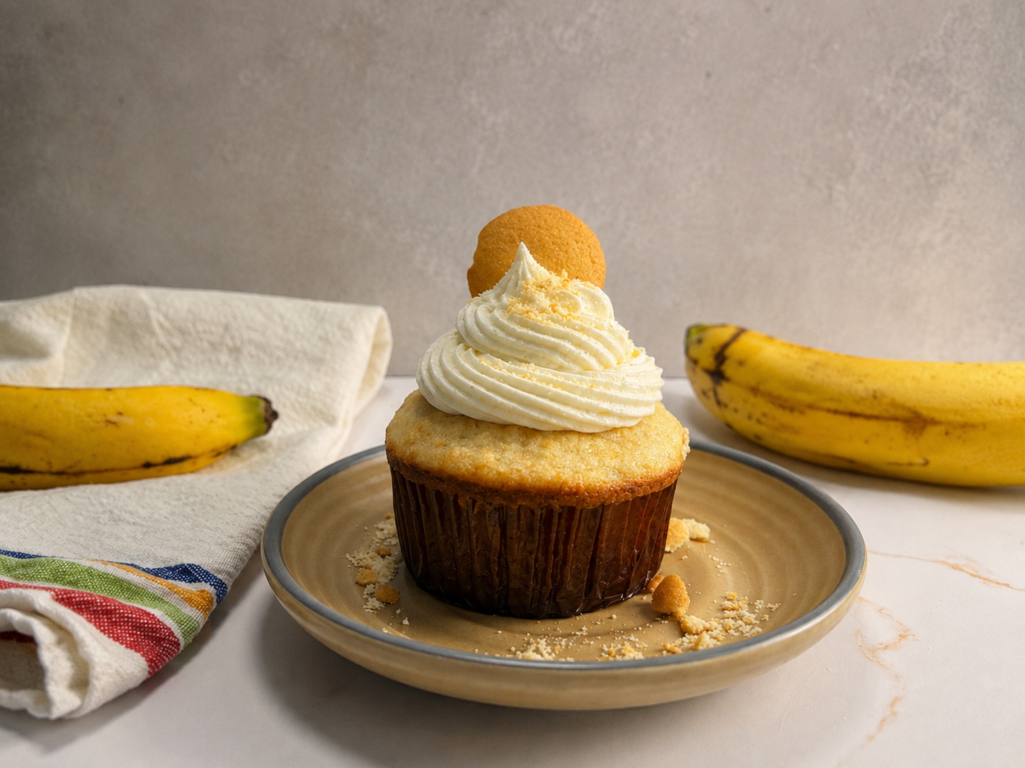 Golden Hour: A banana cupcake filled with silky pastry cream, and topped with a vanilla bean cream cheese frosting.