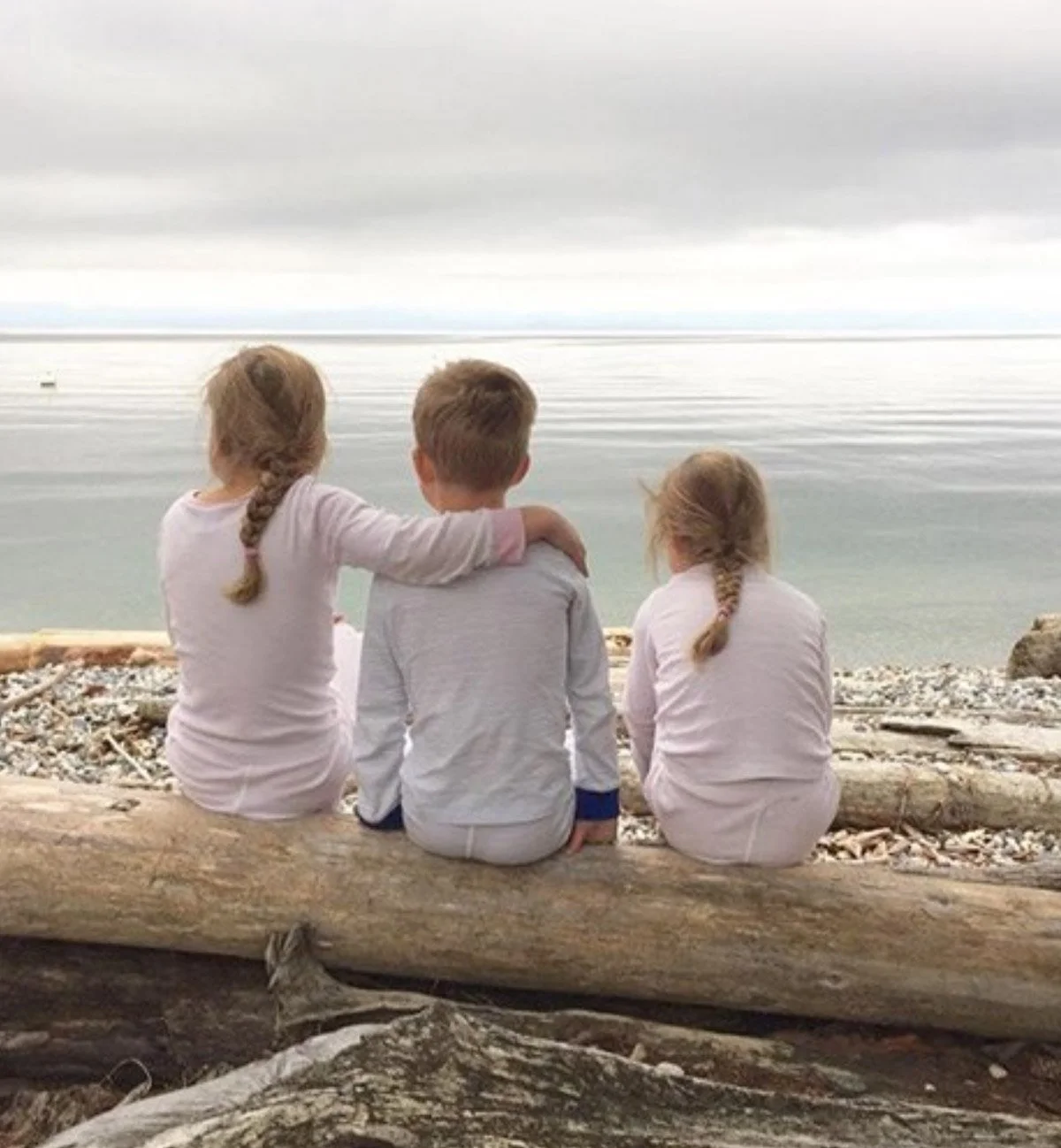 SIblings watching the sun set in BC