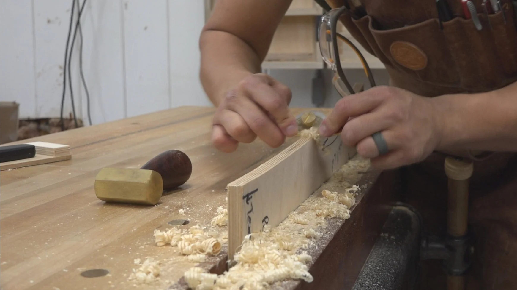 Using a spokeshave to smooth out the curve of the template