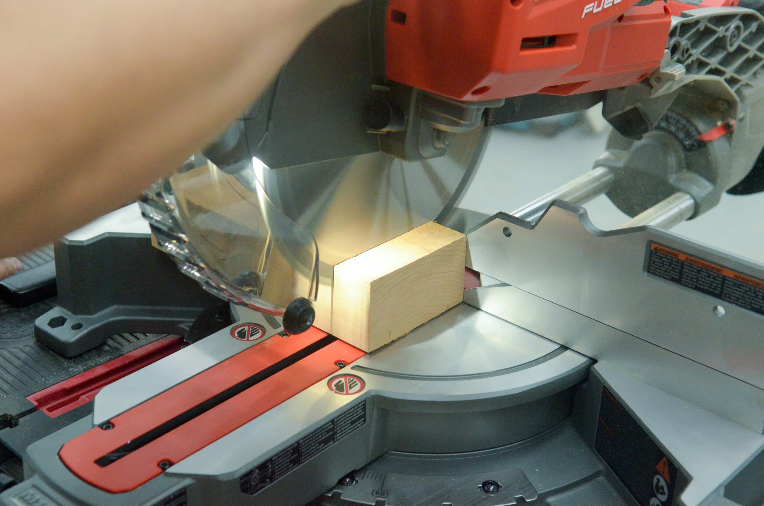 Cutting support blocks for toggle clamps on the Milwaukee 18-volt 10 in. miter saw
