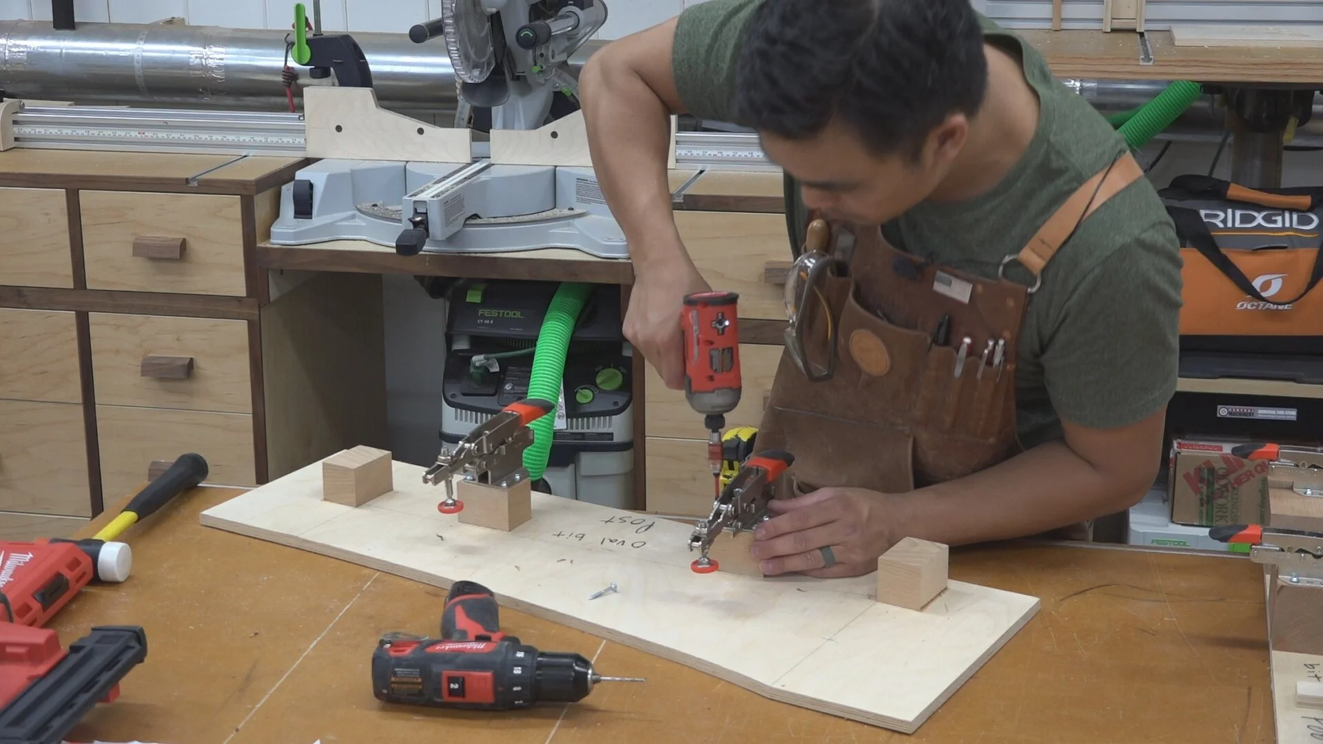 Attaching toggle clamps to the pattern routing jig by predrilling and driving 1-1/2 inch screws