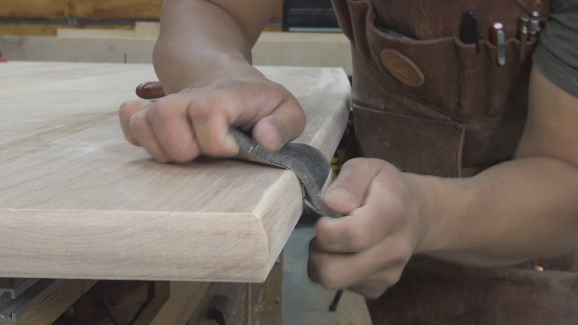 Sandpaper with a flexible backer smooths the edges