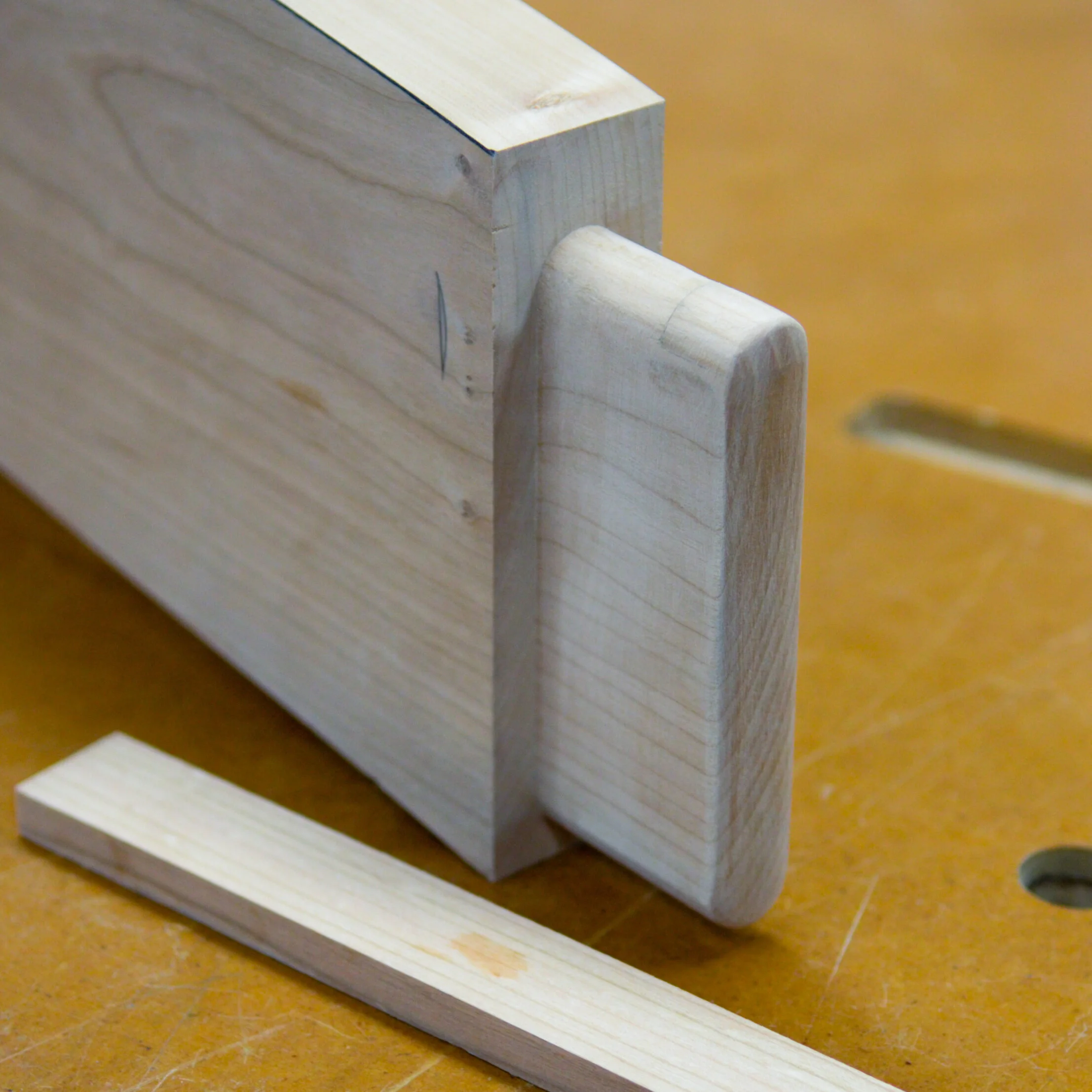 A repair tenon that was gouged by a router bit