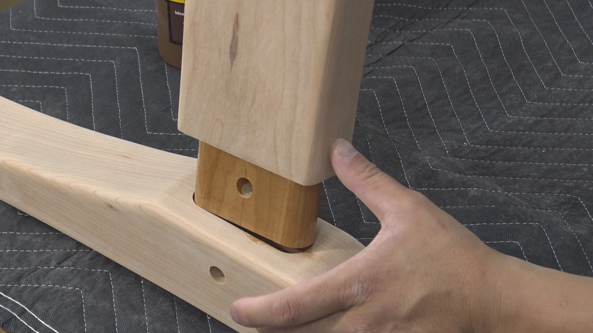 Applying liquid hide glue to the mortise and tenon