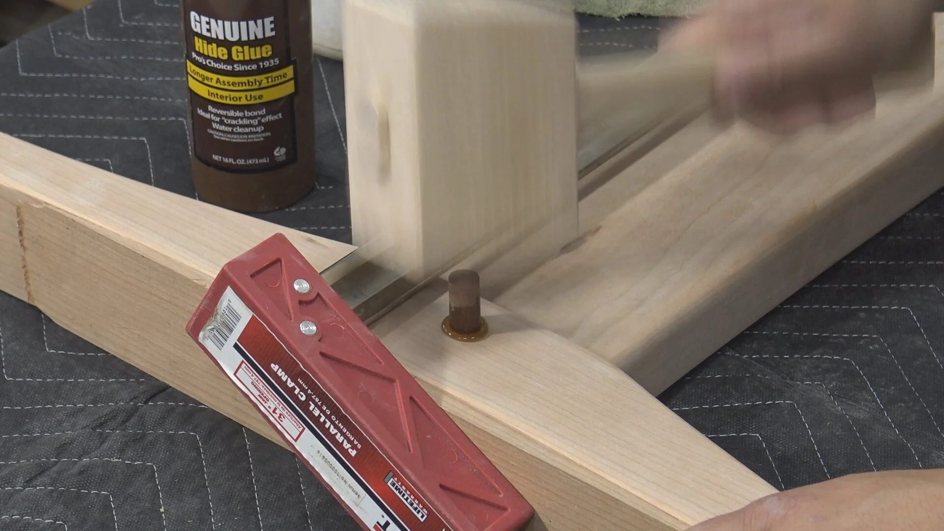 Driving the dowel through the offset holes