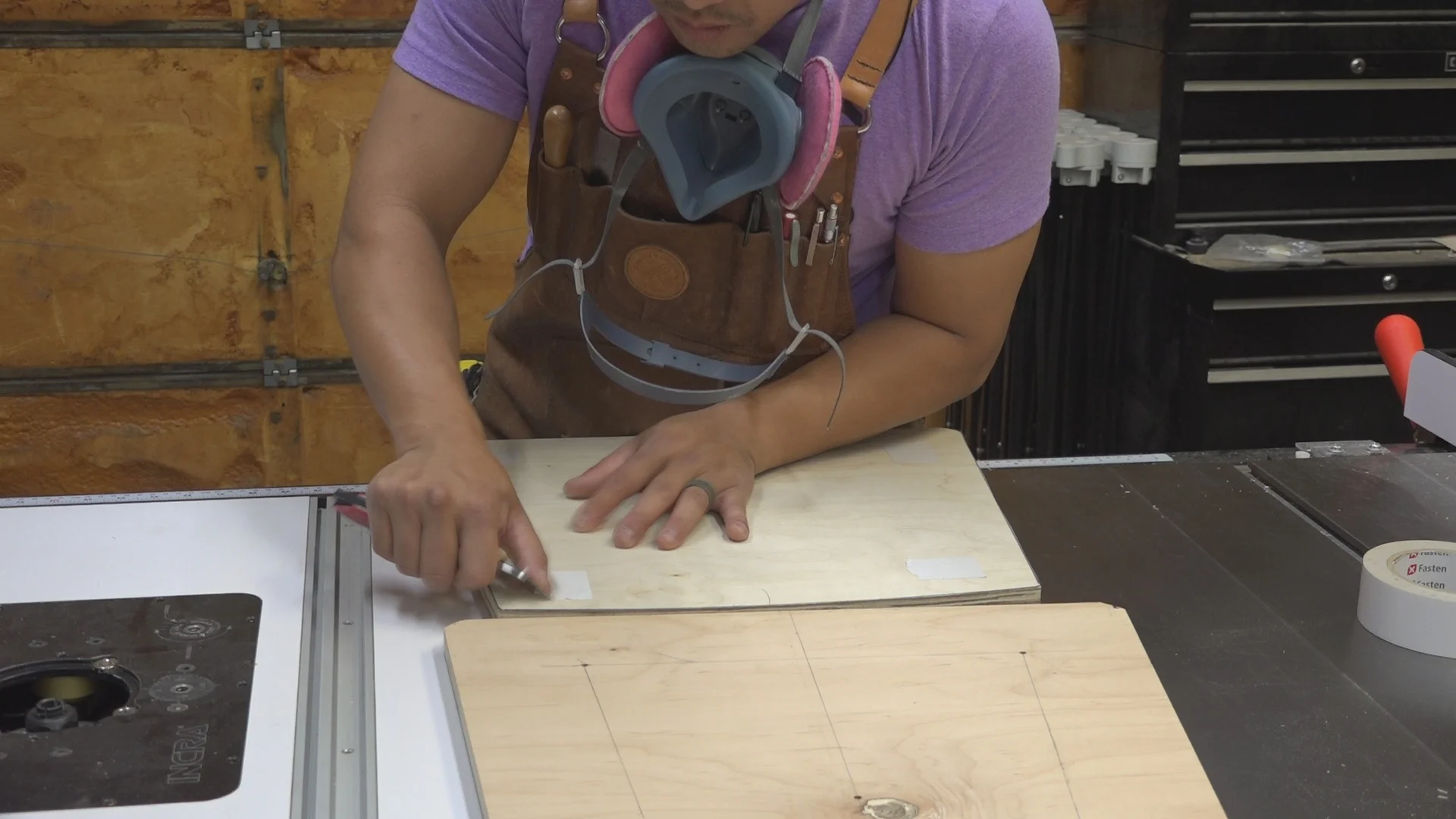 Using double stick tape to temporarily attach the template to the blank.