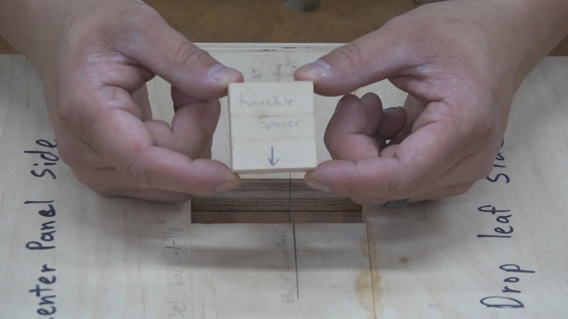 I first need to rout for the knuckle mortise. I use a spacer block that fits into the template to locate the knuckle mortise. The spacer is 1-9/16” long and it goes against the drop leaf side of the hinge template.
