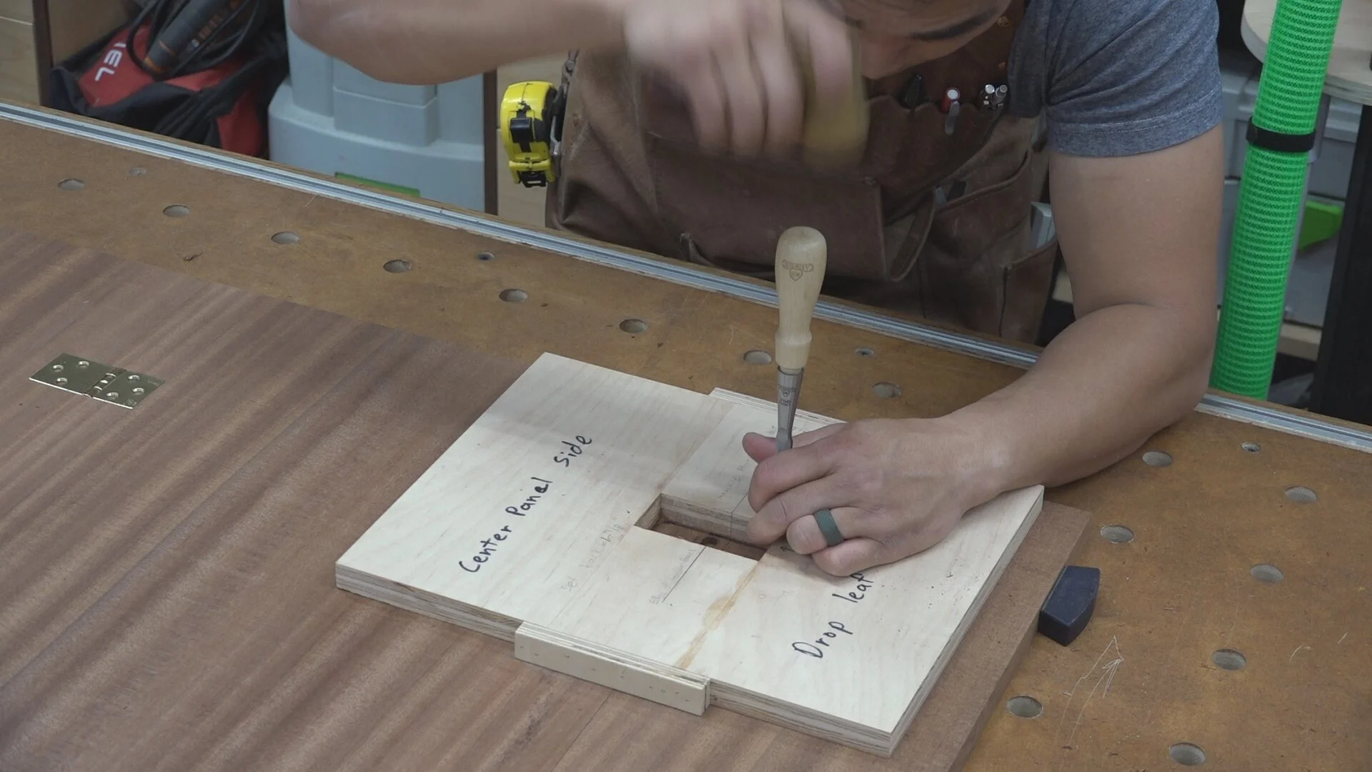 I then use the template as a guide to square up the edges of the hinge mortises with a chisel.