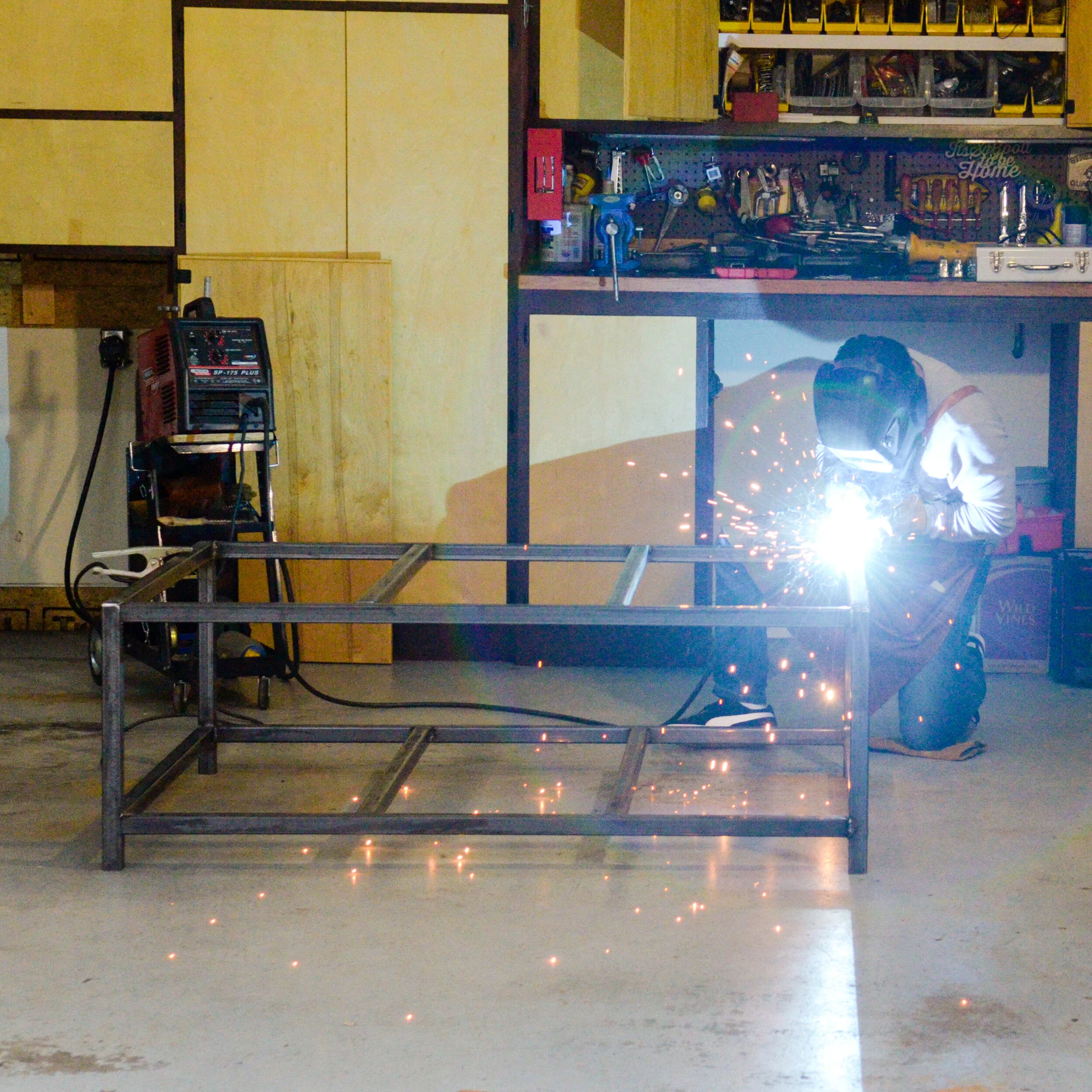 Building a welded steel base for a 4’x4’ CNC spindle machine.