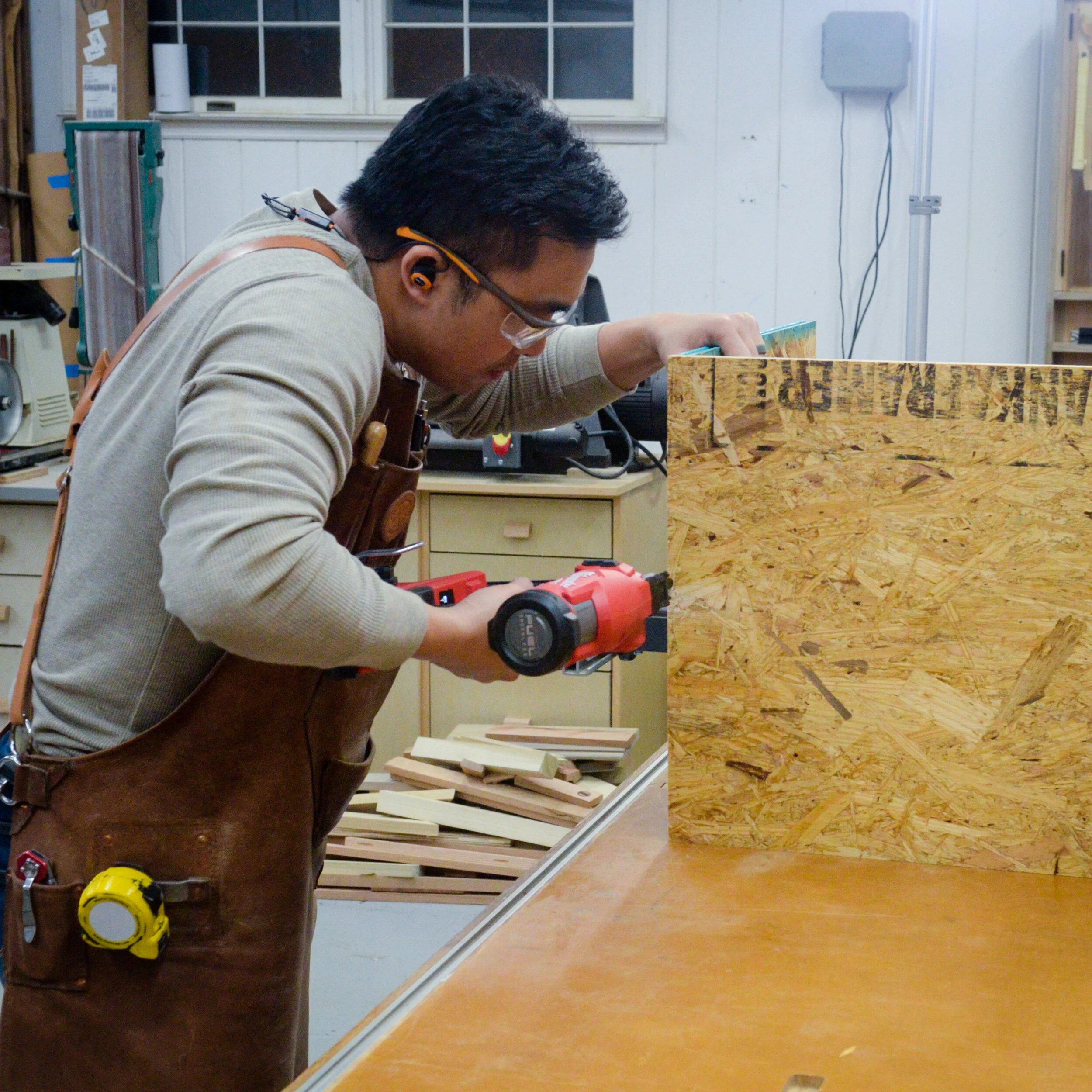 The pieces of the welding jig structure are first glued and brad nailed to tack the pieces together.
