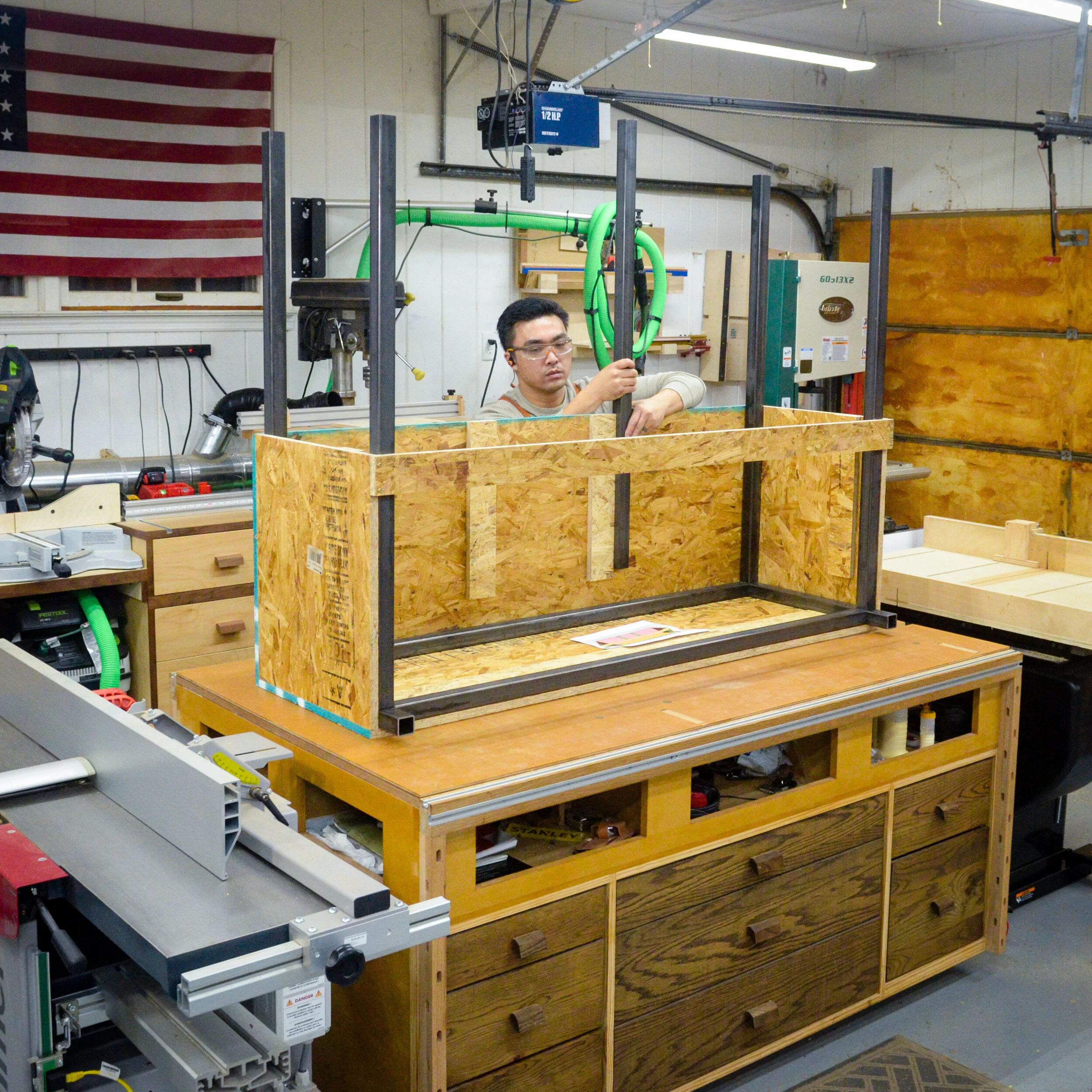 The completed welding jig structure holds the steel tubing in place while it’s being welded.