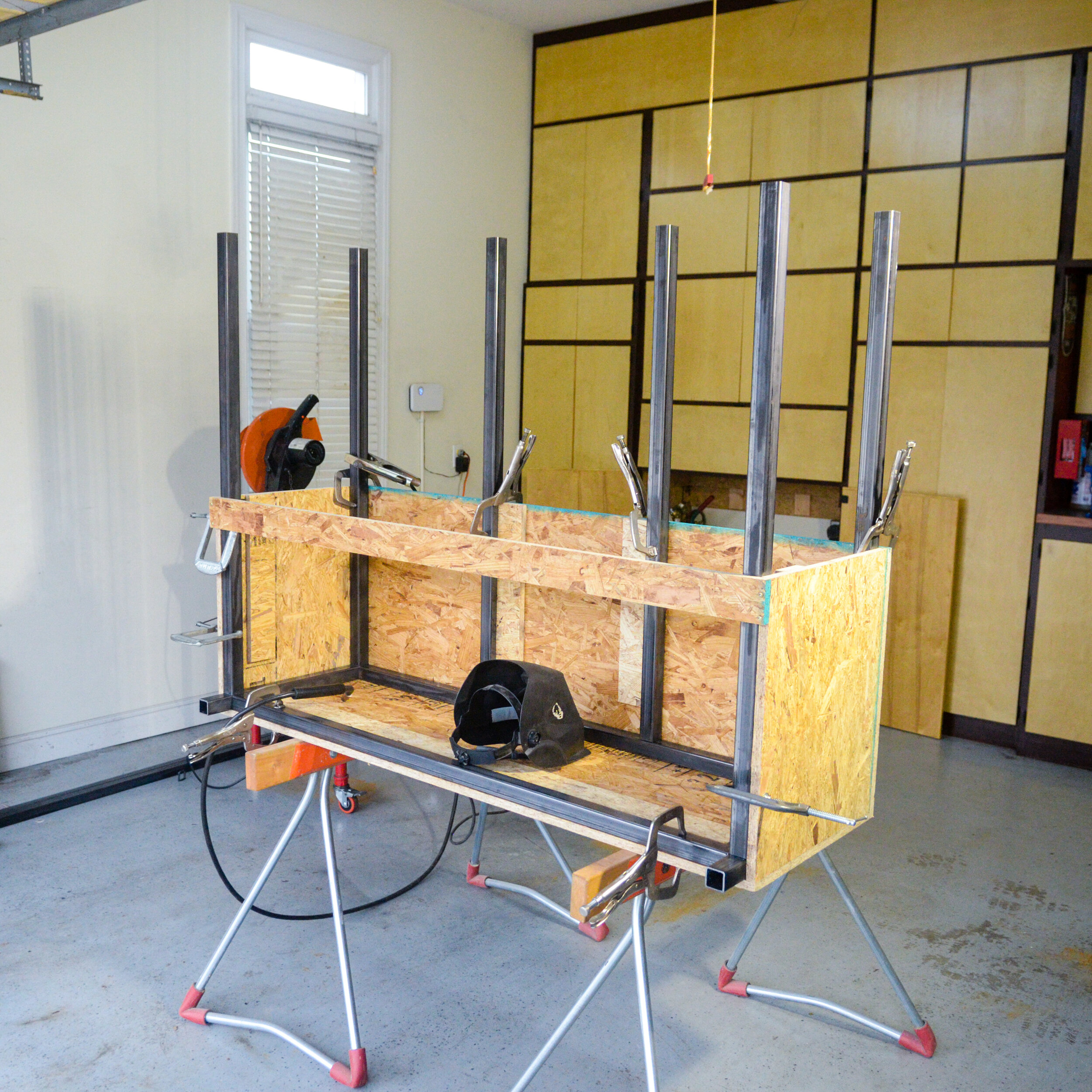 The welding jig structure holds the steel tubing in place as each piece is welding into place.