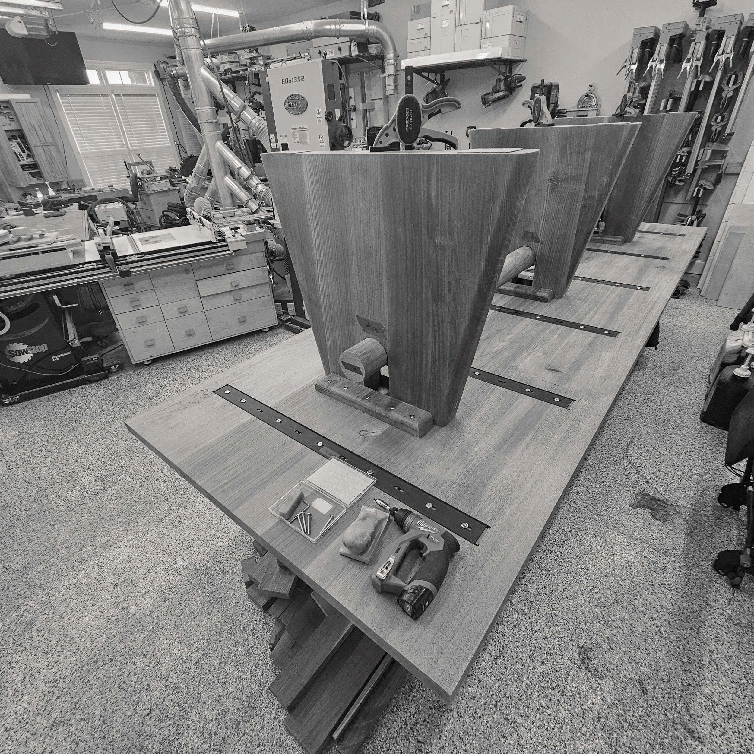 Trestle base positioned against the underside of the tabletop (Copy)