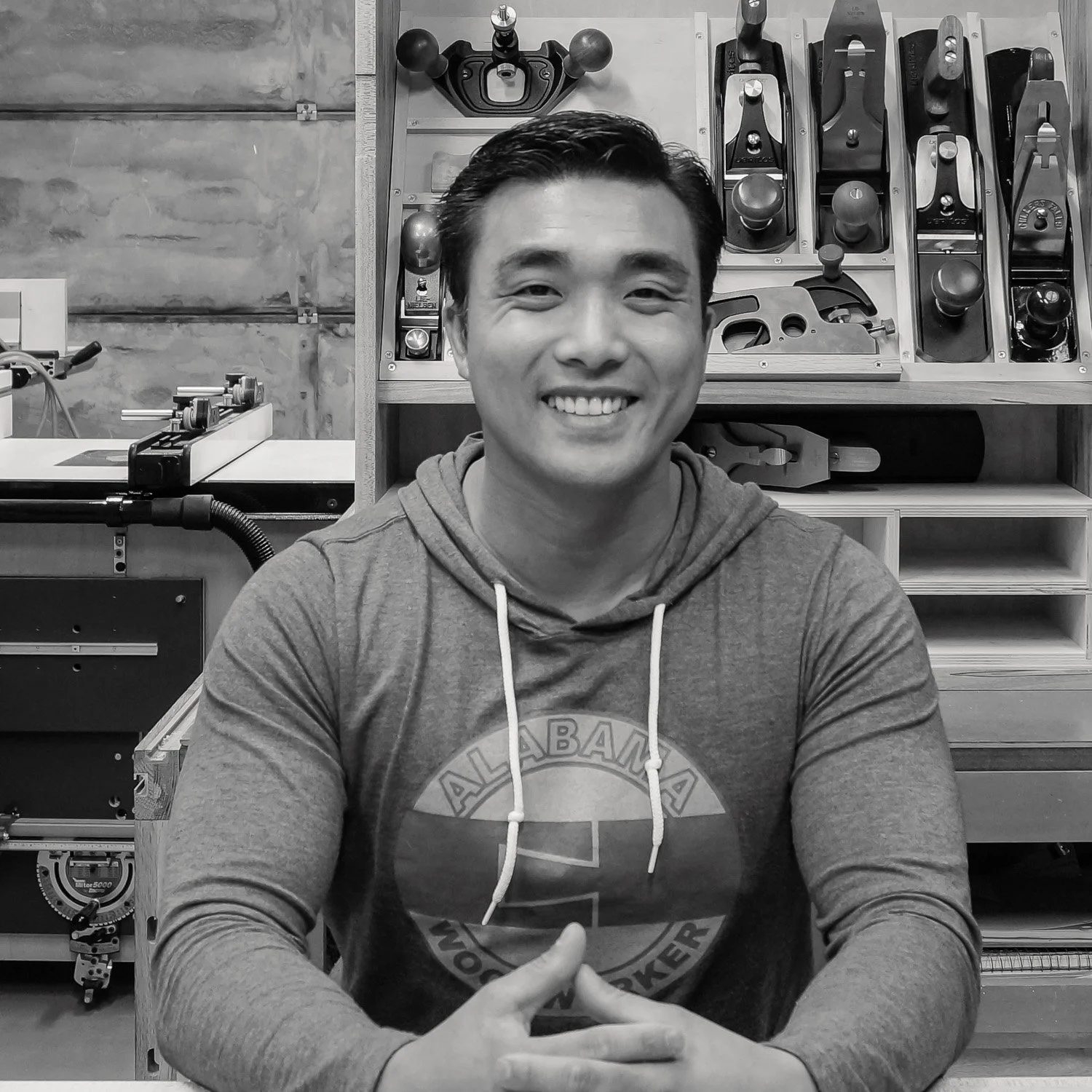 Huy Huynh in his woodworking studio