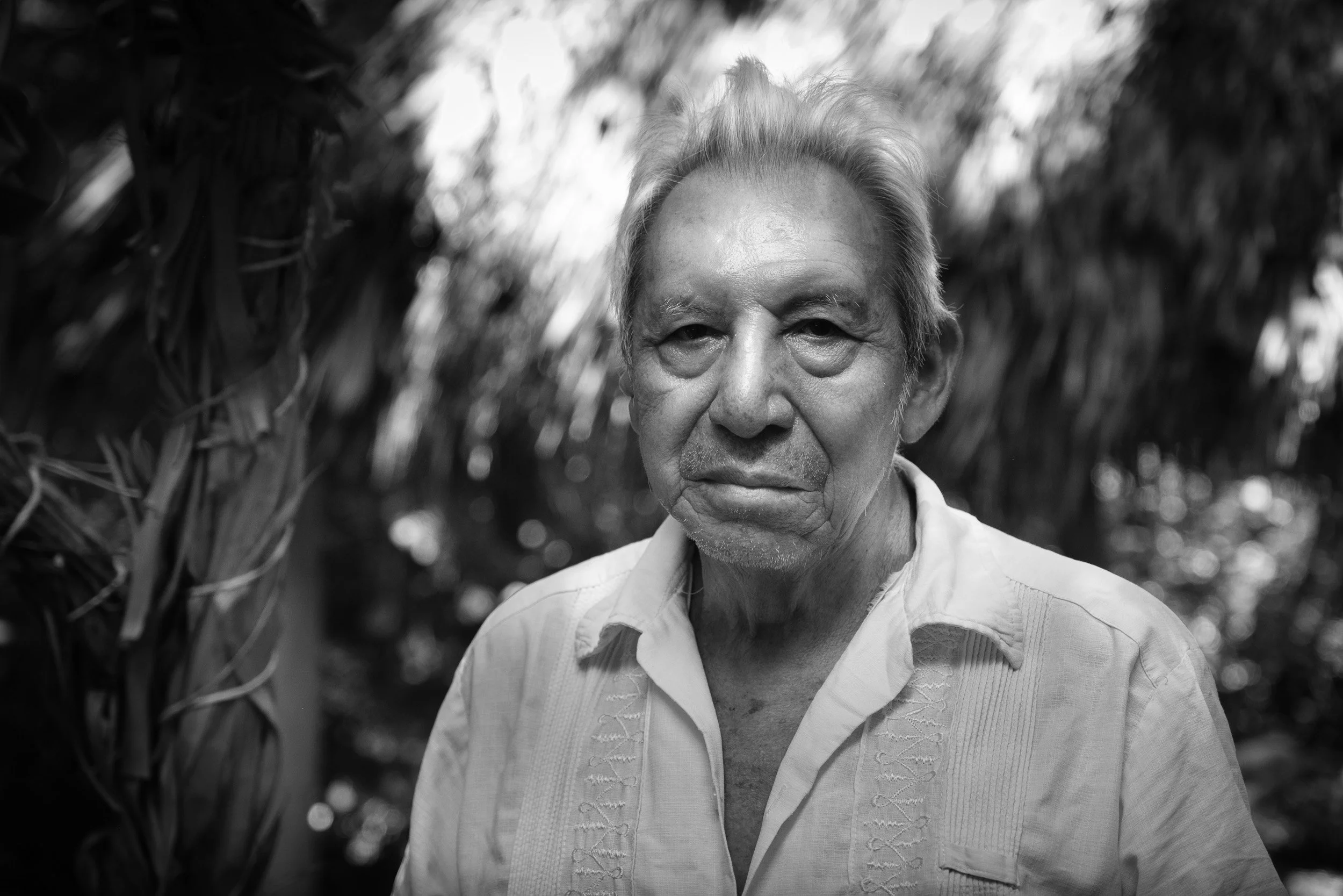 Black and white fine art portrait of a Maya elder from the From Land to Sea series by Tommy Salpietro. Documentary photography exploring Indigenous culture, tradition and identity in the Yucatán Peninsula, Mexico.