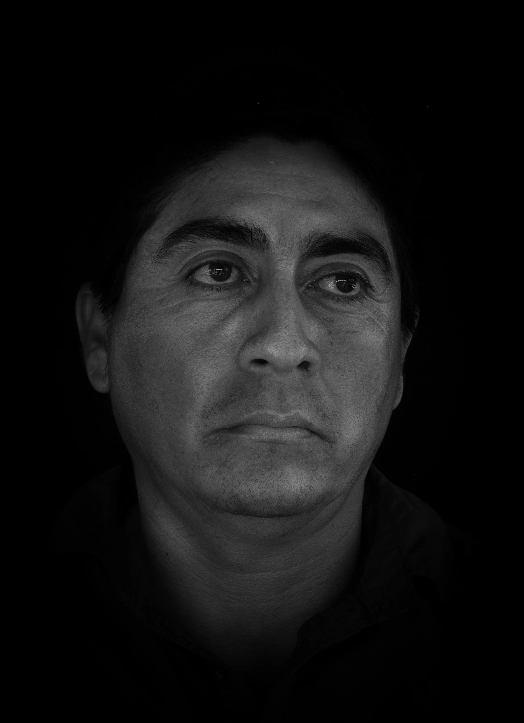 Black and white fine art portrait from From Land to Sea by Tommy (Thomas) Salpietro, depicting a Maya community member in the Yucatán Peninsula, Mexico.