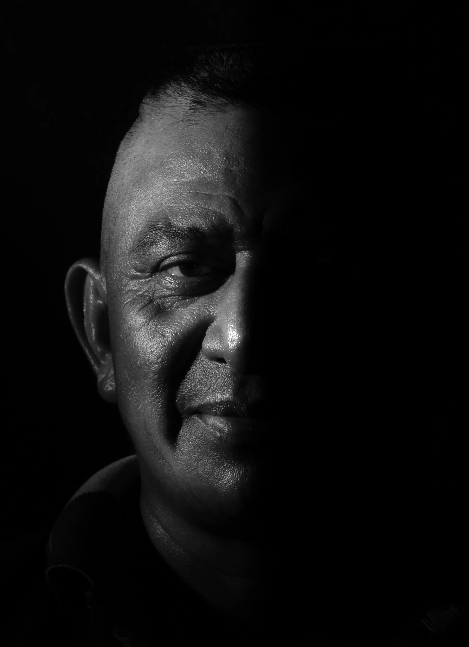 Black and white fine art portrait from From Land to Sea by Tommy (Thomas) Salpietro, depicting a Maya Elder in the Yucatán Peninsula, Mexico.